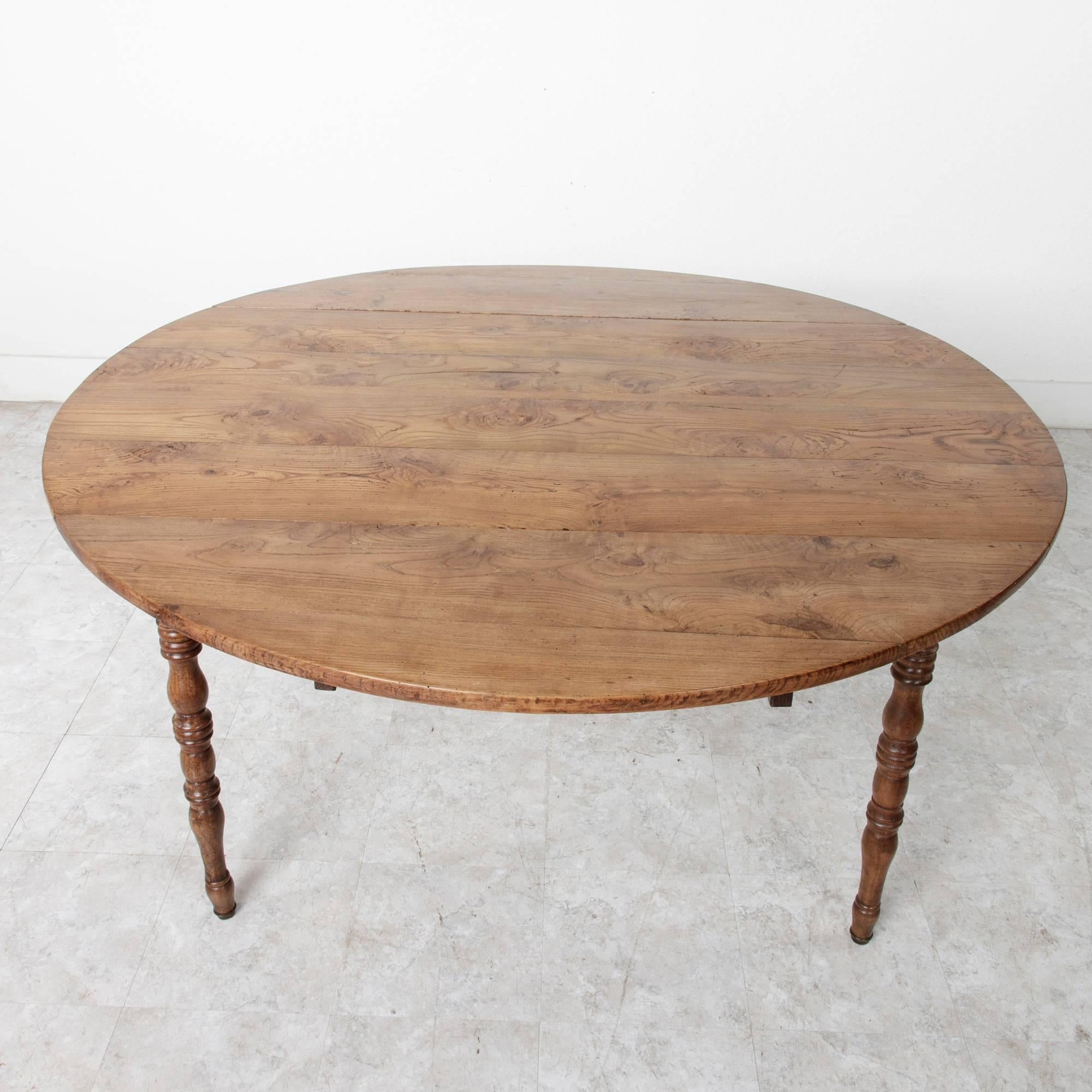 19th Century French Solid Elm Round Dining Table with Drop Leaves 2