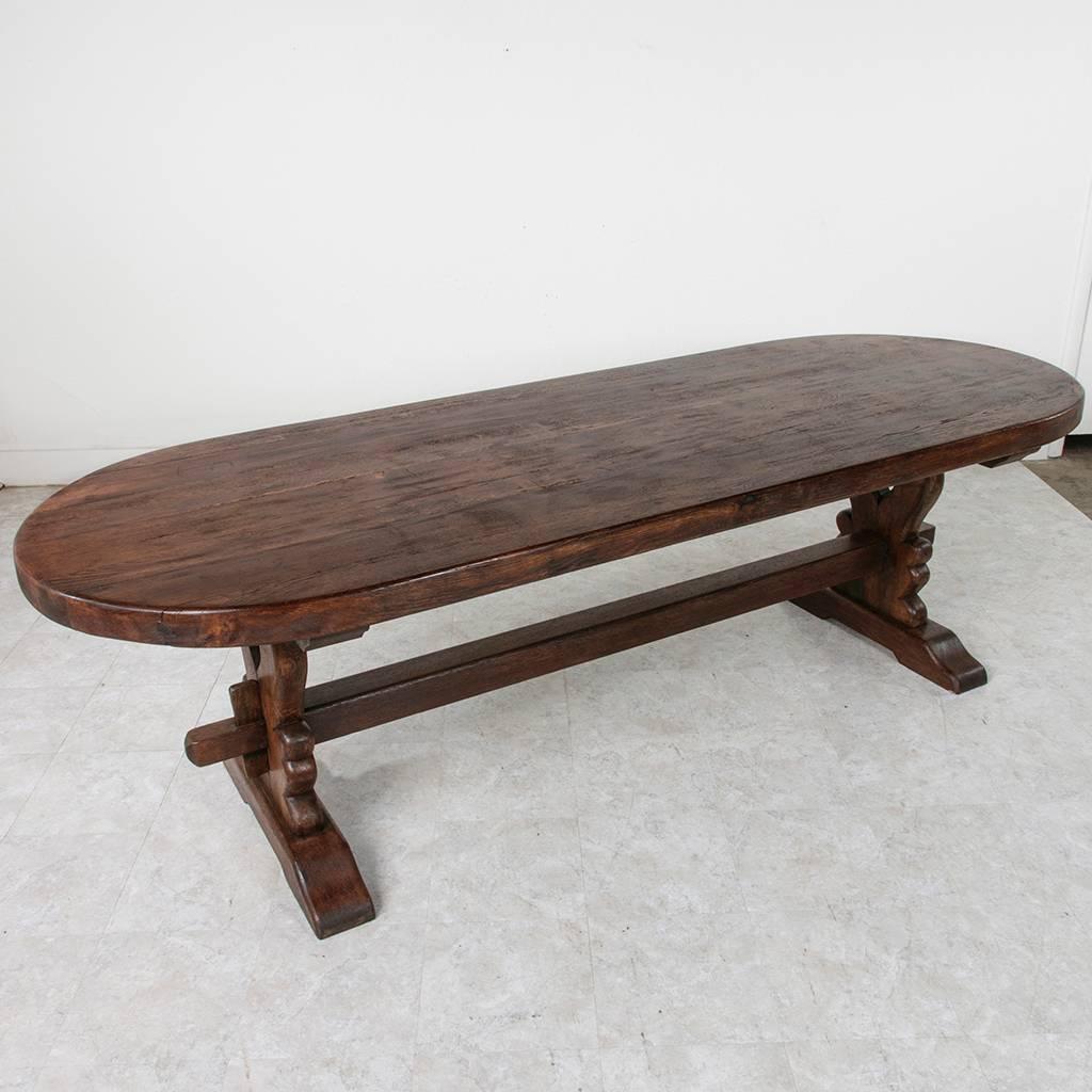 Grand Antique French Handmade Solid Oak Oval Monastery Farm Dining Table In Excellent Condition In Fayetteville, AR