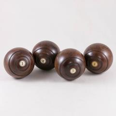 Mid-Century Set of Four English Competition Lawn Balls Marked with Years of Play