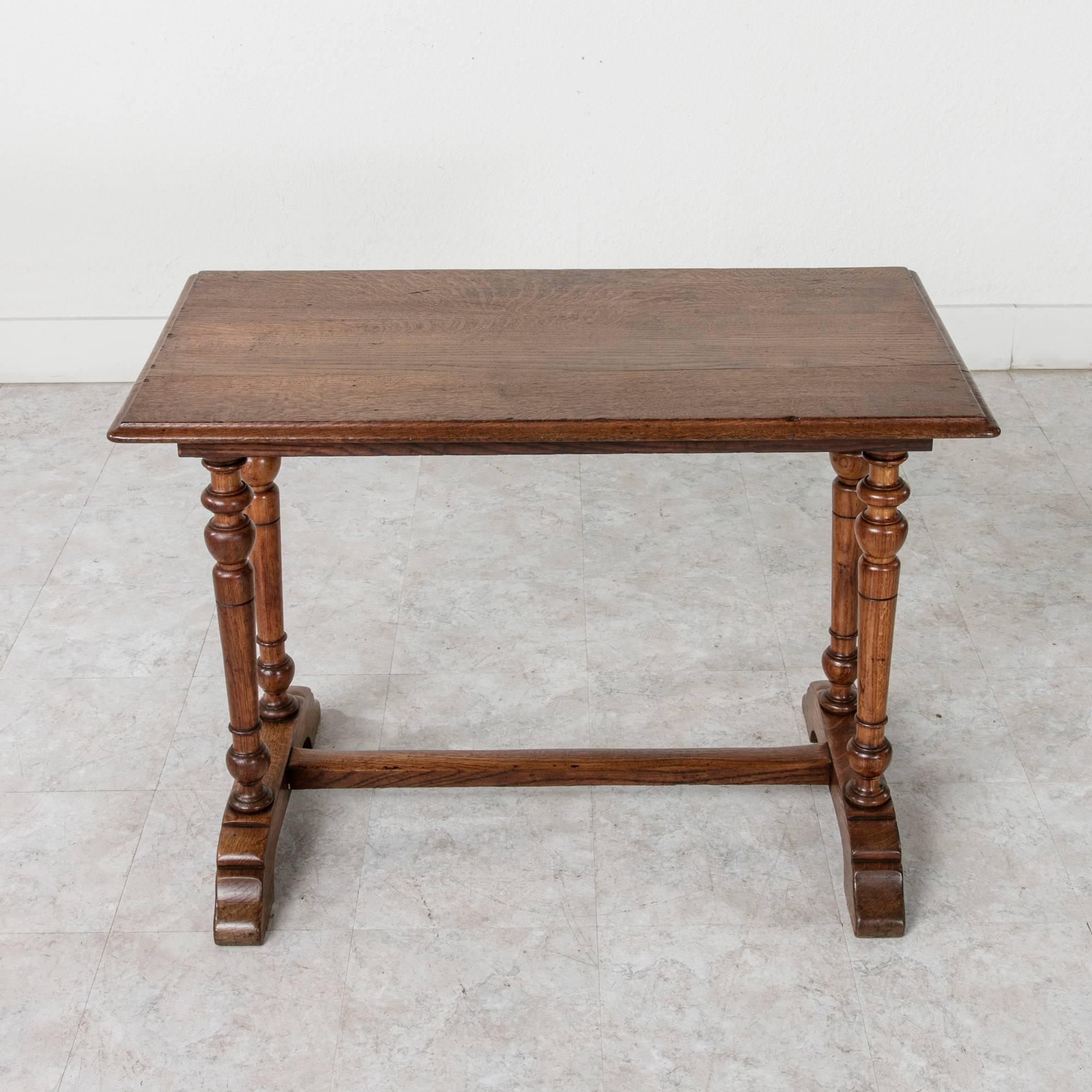 A bistro table? A breakfast table? A writing desk? This circa 1930 French oak table is all three. Its solid construction is perfect for a game of dominoes, even for the most energetic of players, but its versatility also lends itself to use in a