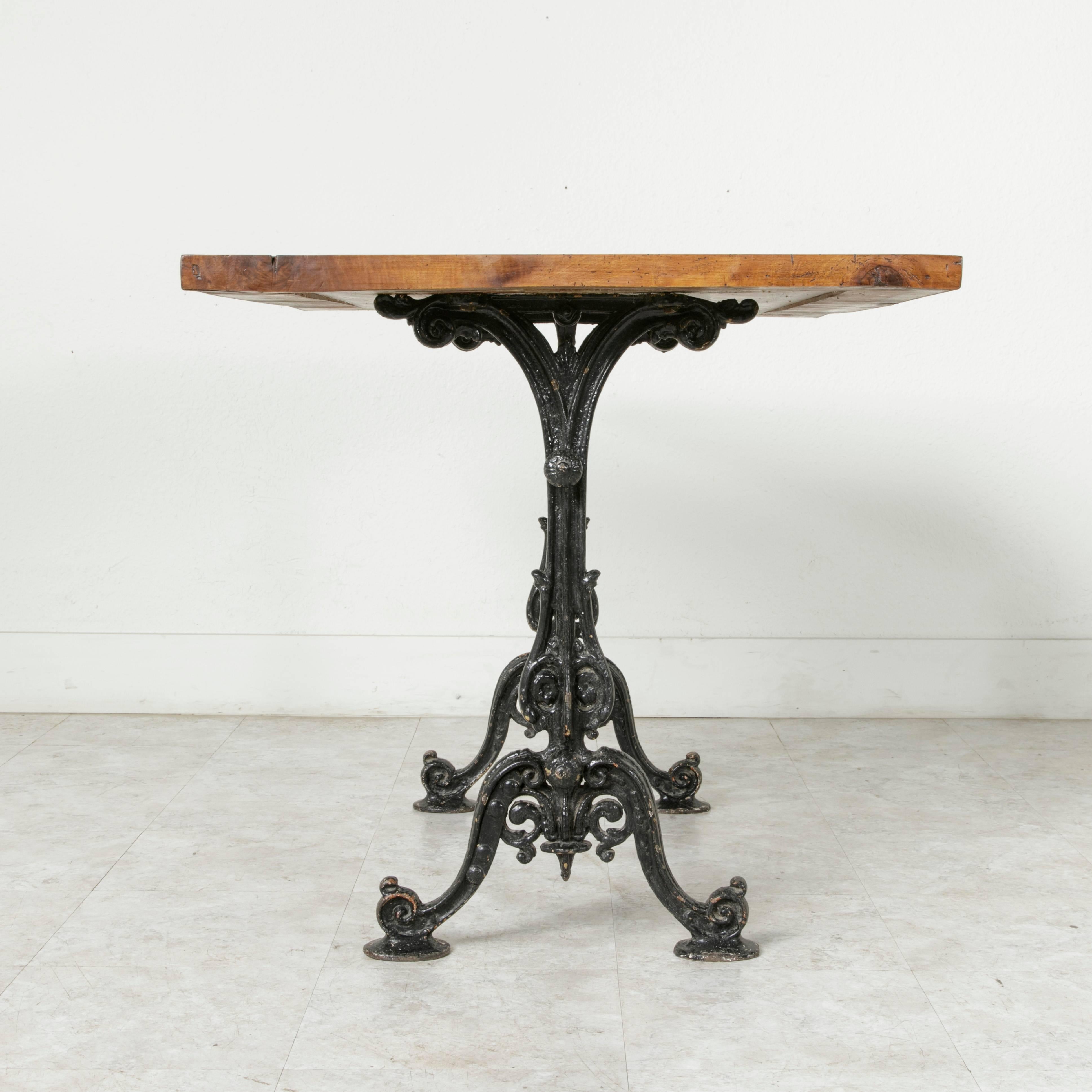 Late 19th Century Cast Iron Bistro Table Cafe Table with Solid Walnut Top In Excellent Condition In Fayetteville, AR