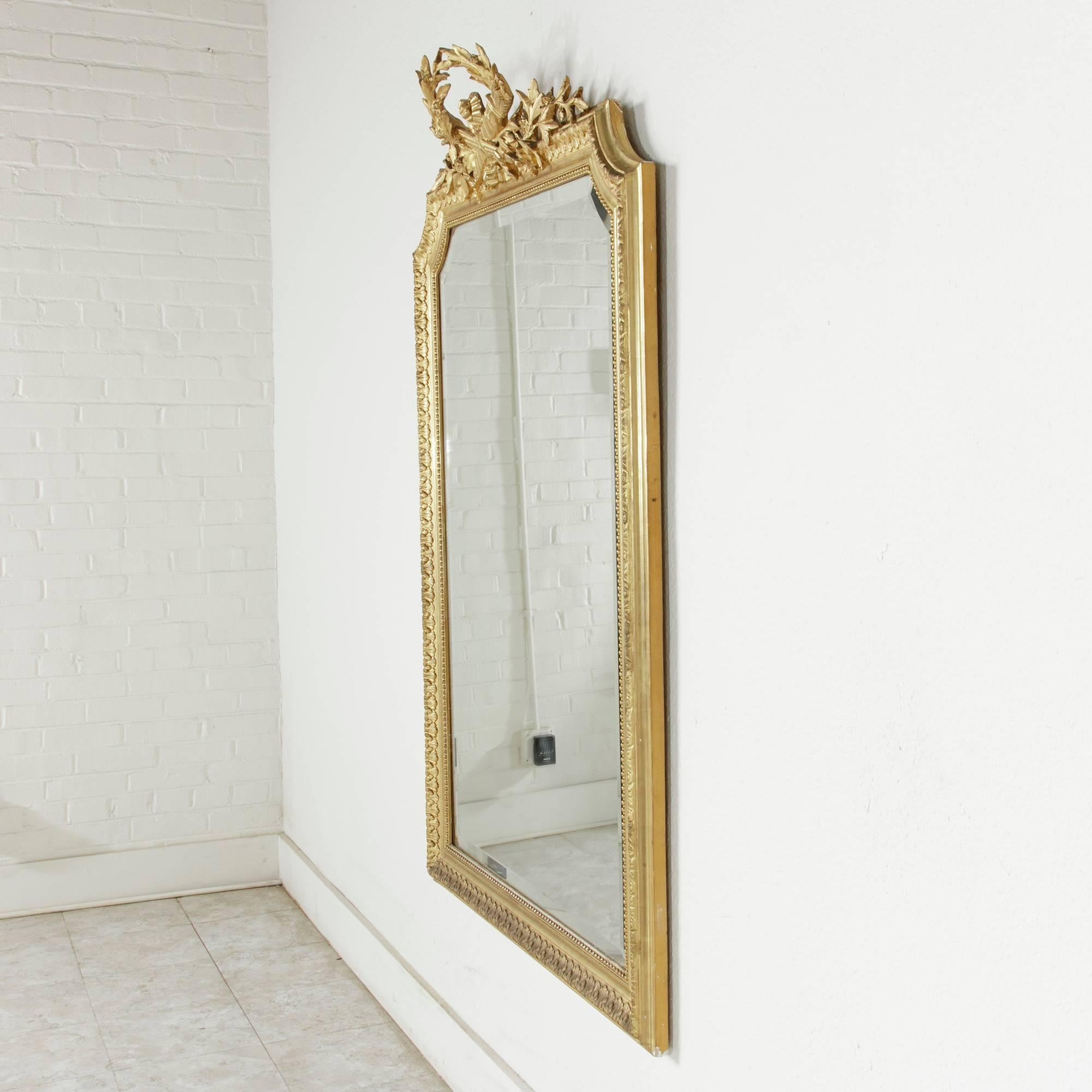 Late 19th Century Louis XVI Style Large Giltwood Mirror with Beveled Glass 4