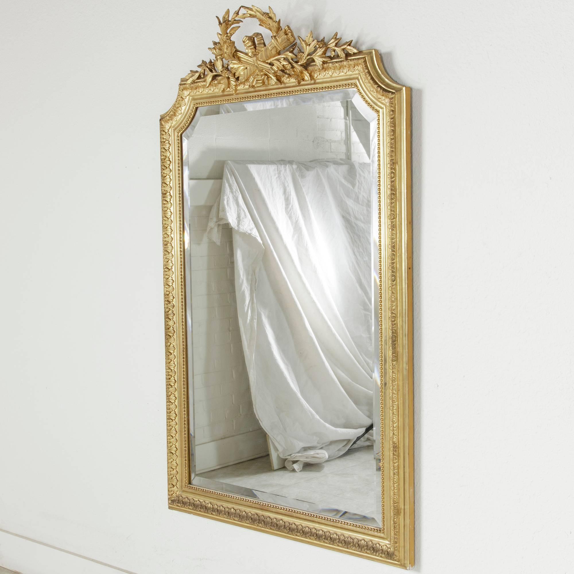 Late 19th Century Louis XVI Style Large Giltwood Mirror with Beveled Glass 3