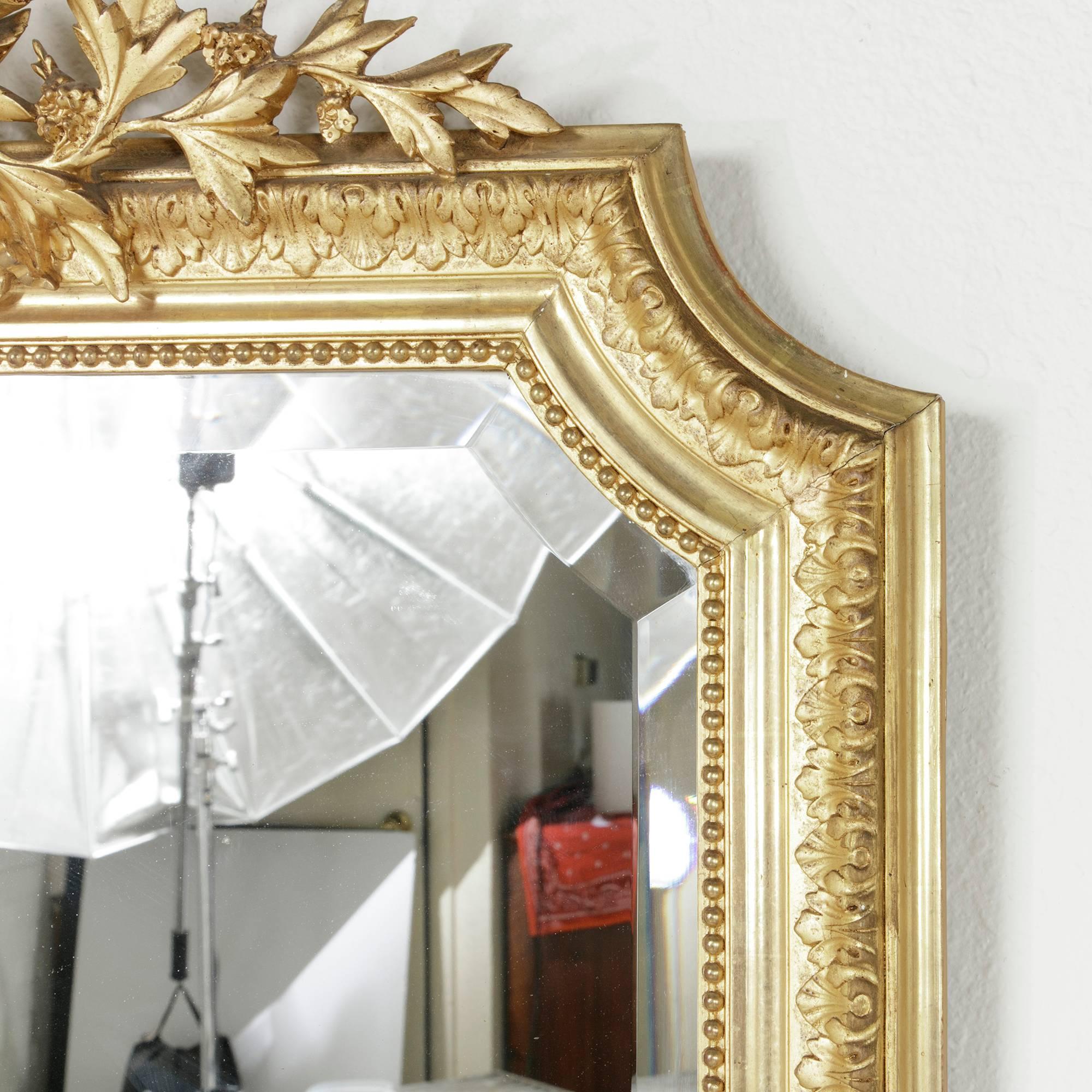 French Late 19th Century Louis XVI Style Large Giltwood Mirror with Beveled Glass