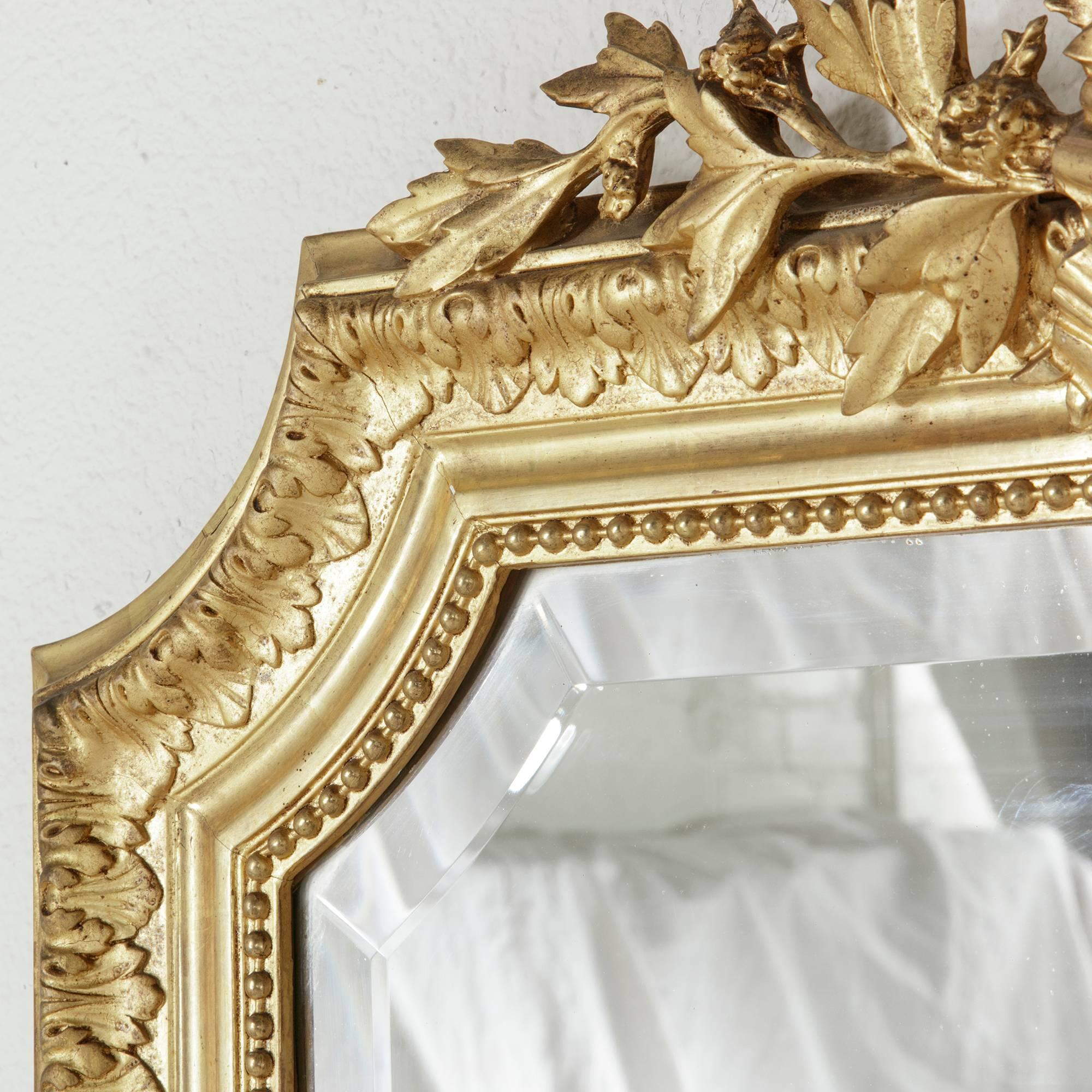Late 19th Century Louis XVI Style Large Giltwood Mirror with Beveled Glass In Excellent Condition In Fayetteville, AR