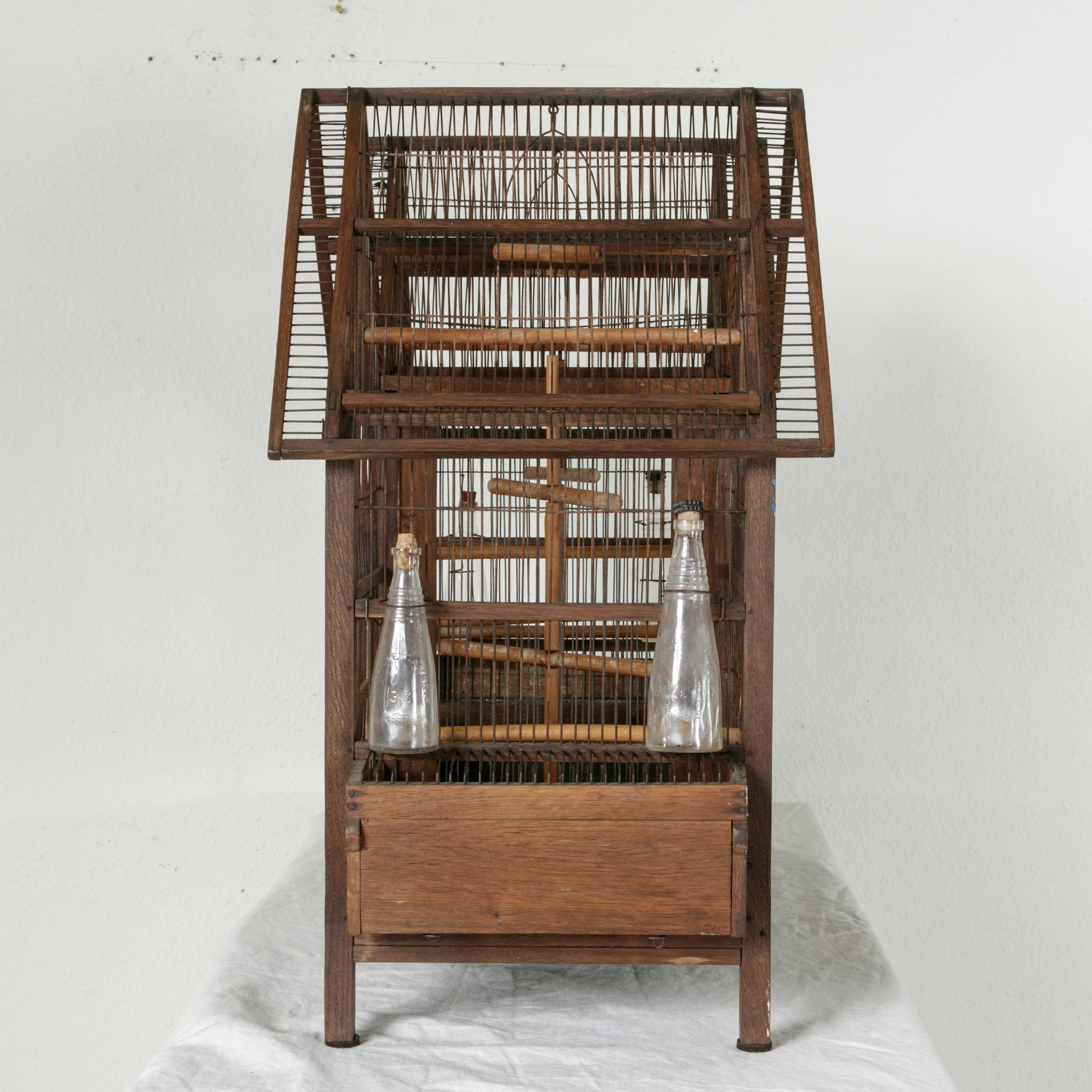 Glass Early 20th Century Double Gabled Wood and Wire Birdcage with Two Compartments