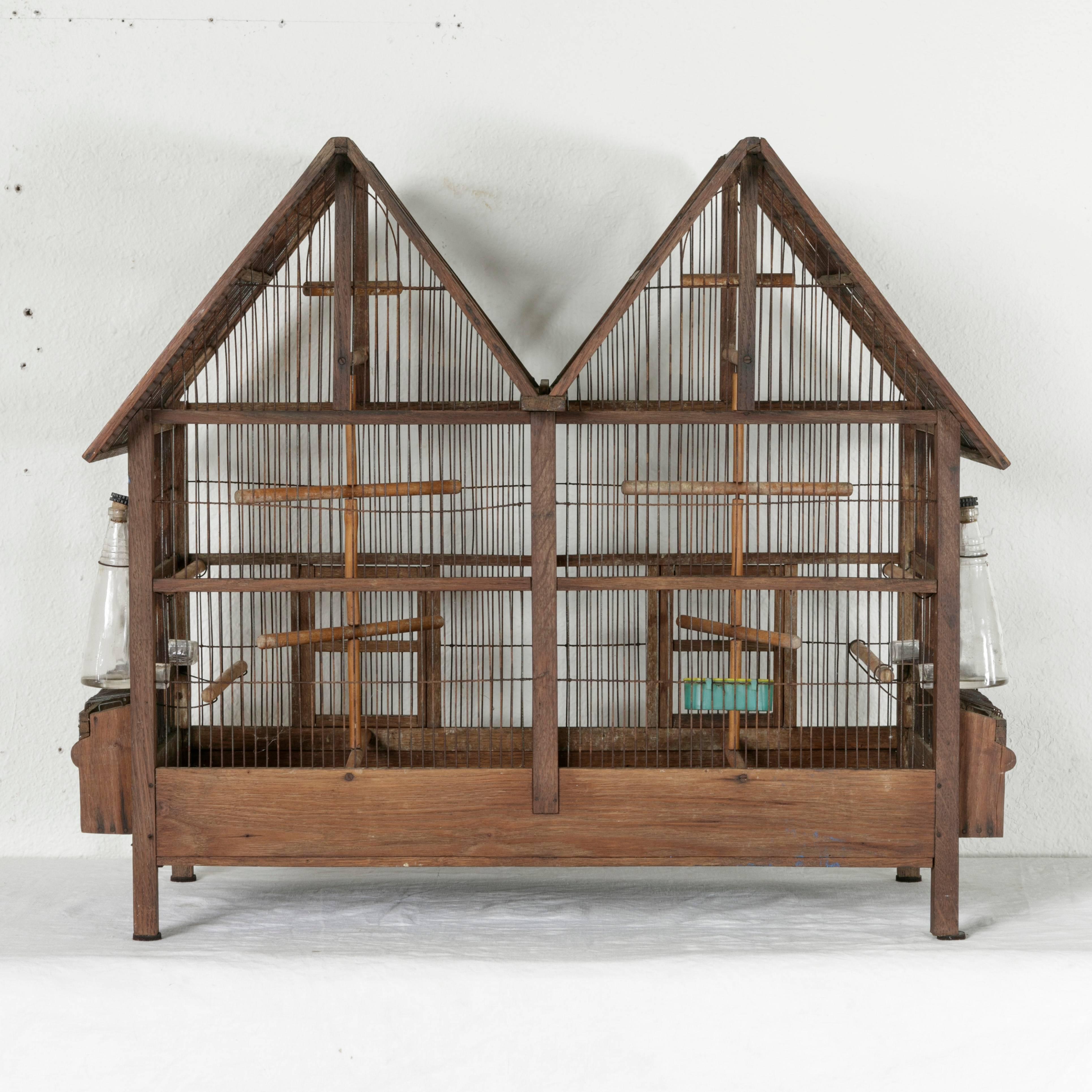 Early 20th Century Double Gabled Wood and Wire Birdcage with Two Compartments In Excellent Condition In Fayetteville, AR