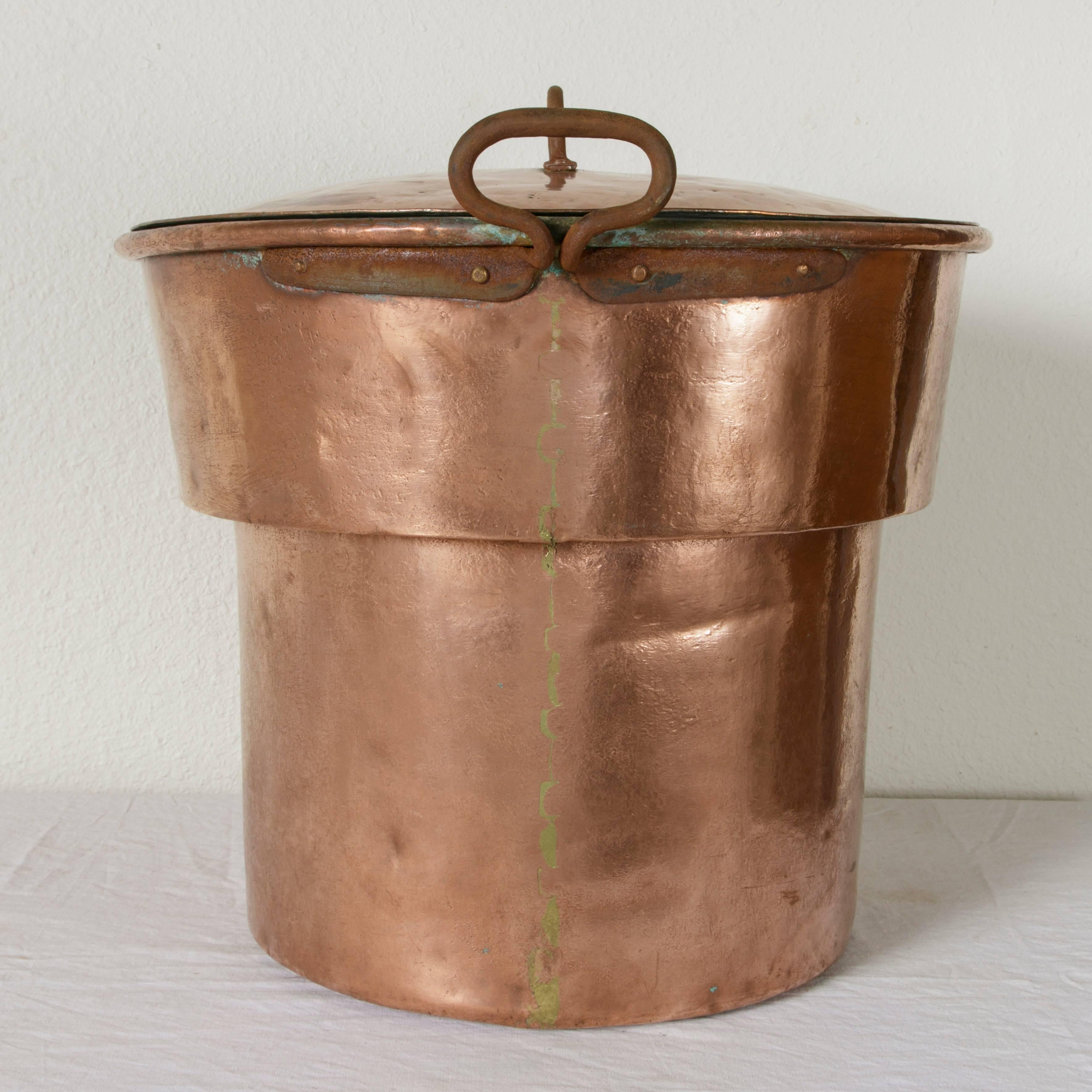 large copper pot with lid