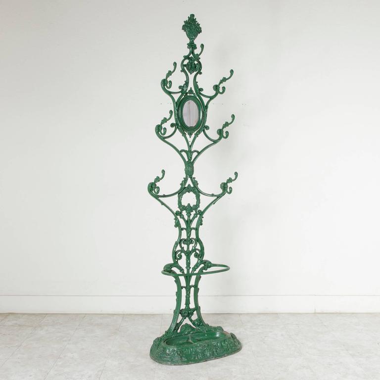 Late 19th Century Cast Iron Hall Tree with Mirror, Seven Hooks, and Umbrella Pan at 1stDibs