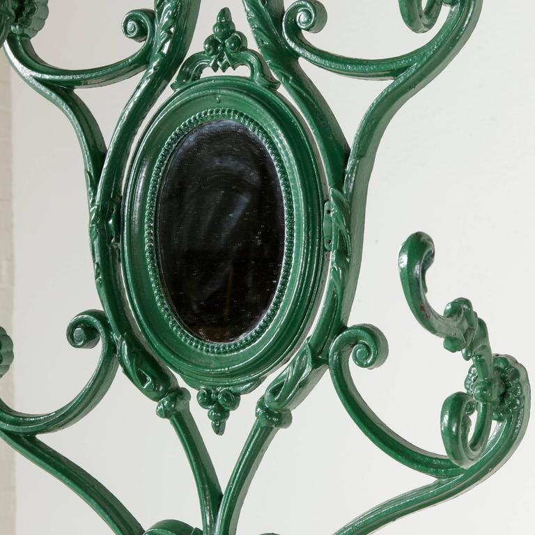 Late 19th Century Cast Iron Hall Tree with Mirror, Seven Hooks, and Umbrella Pan at 1stDibs