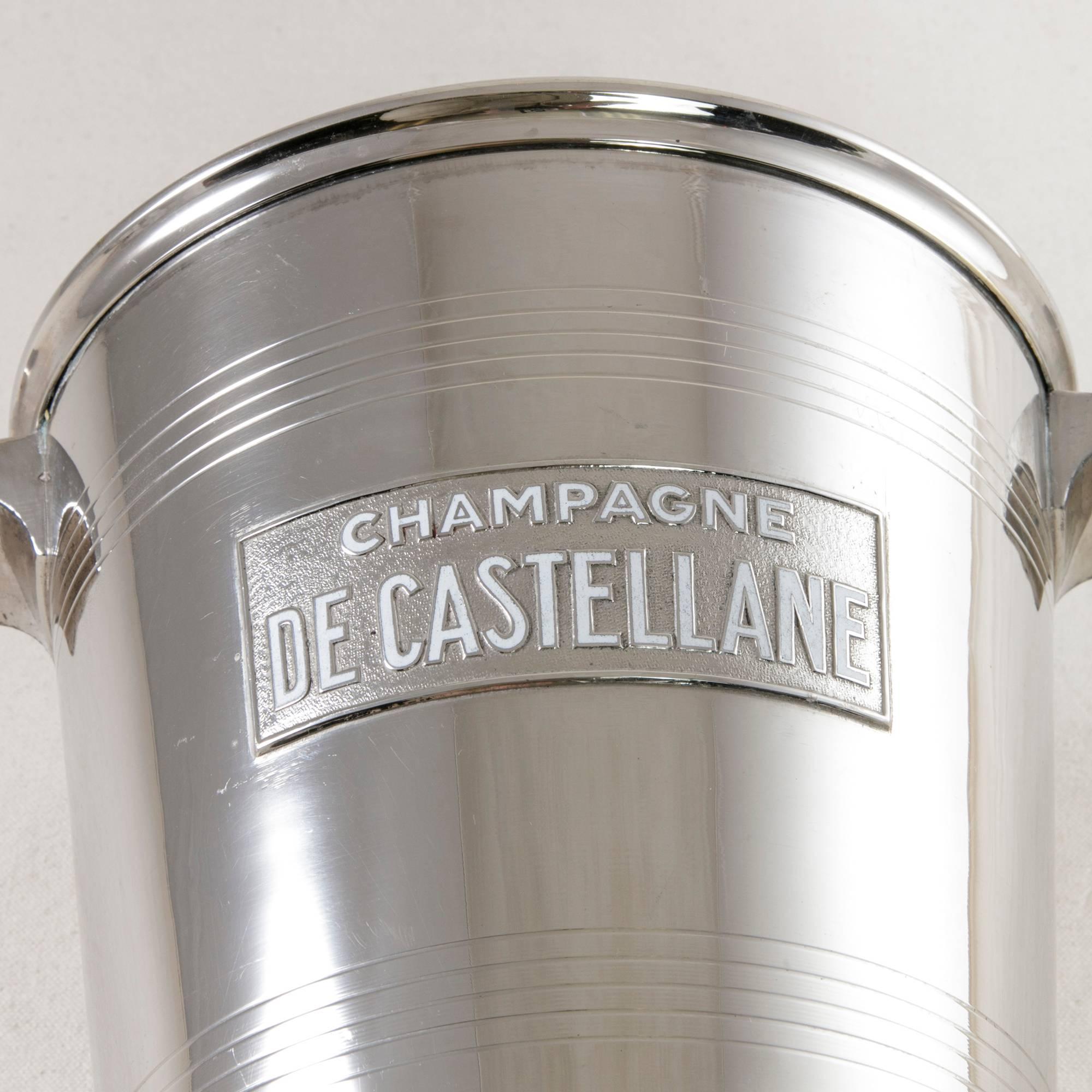 This Art Deco period silver plate champagne bucket features the name de Castellane in white enameled letters. De Castellane is a champagne producer dating back to the year 1895 when it was founded in the city of Epernay, the champagne capital of