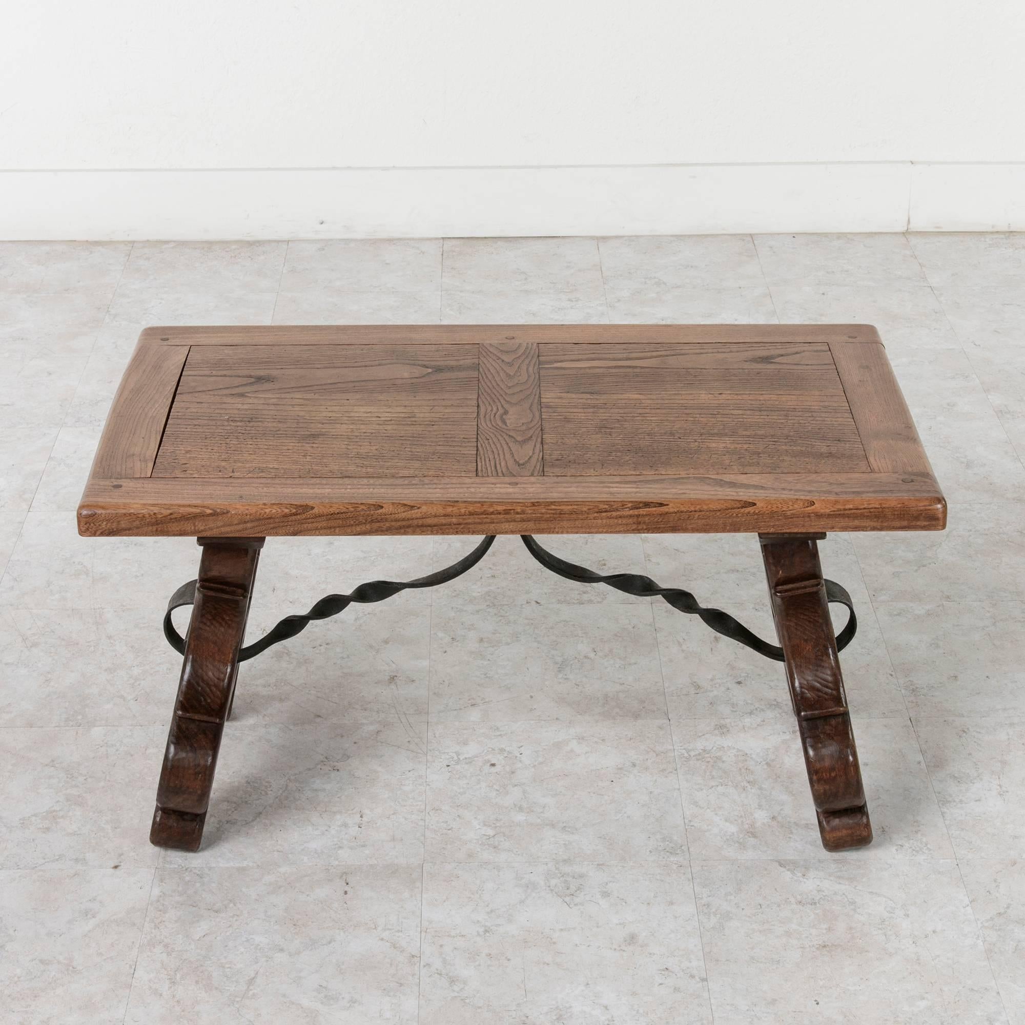 French Early 20th Century Spanish Style Oak Coffee Table or Bench with Iron Stretcher