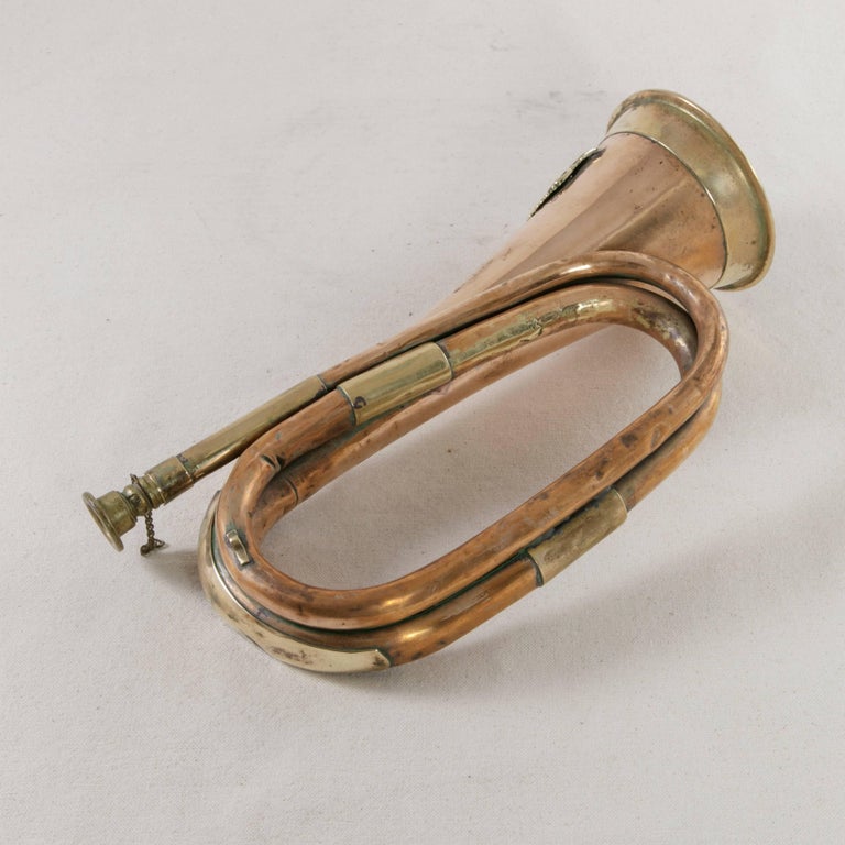 Early 20th Century French Copper and Brass Cavalry Bugle with Bronze Insignia at 1stDibs
