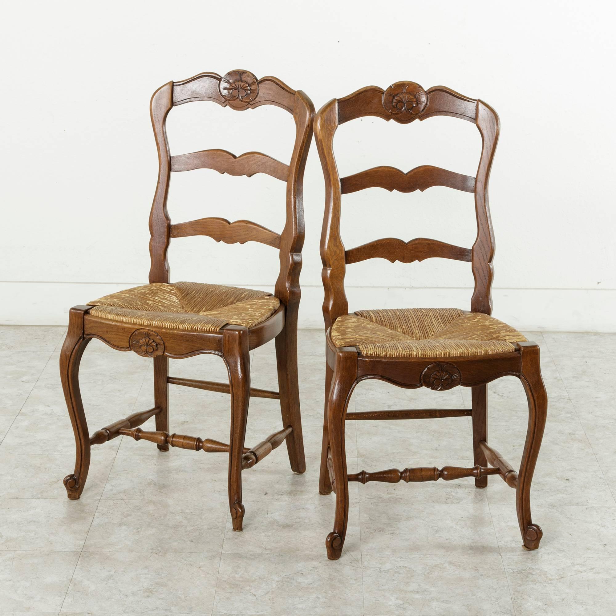 Set of Four French Louis XV Style Carved Oak Chairs with Rush Seats In Good Condition In Fayetteville, AR