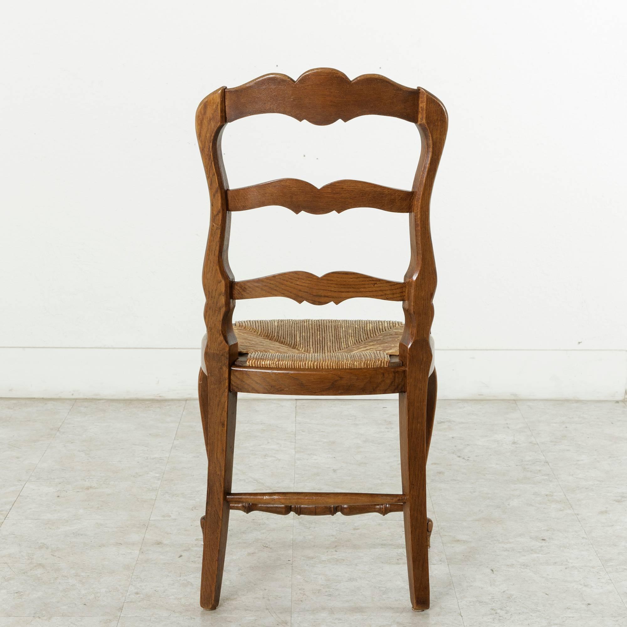 Set of Four French Louis XV Style Carved Oak Chairs with Rush Seats 2