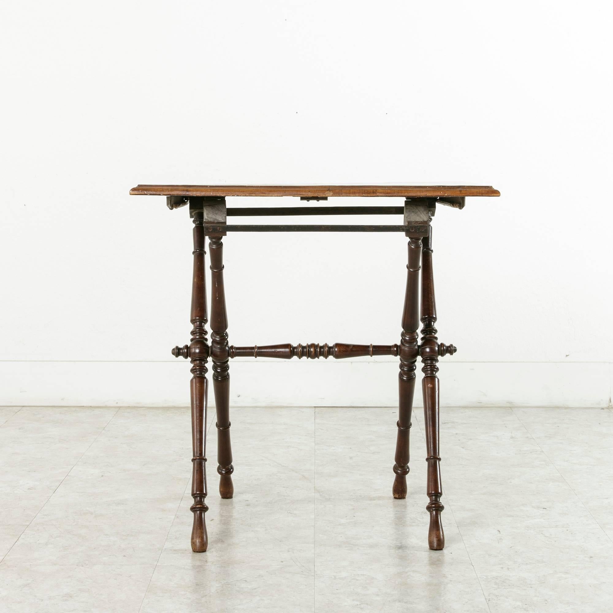Iron Late 19th Century Folding French Campaign Style Table Rosewood and Mahogany Top