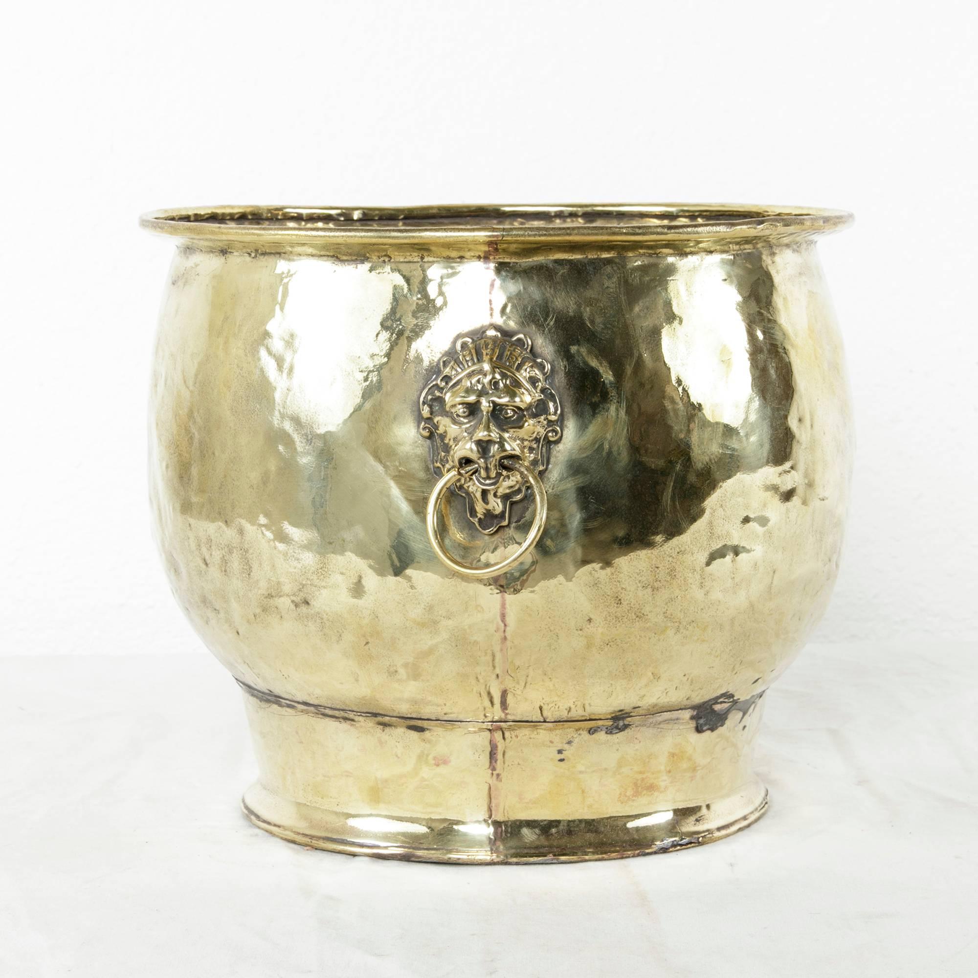 Hammered Large Late 17th Century French Louis XIV Period Brass Cachepot with Lion Heads