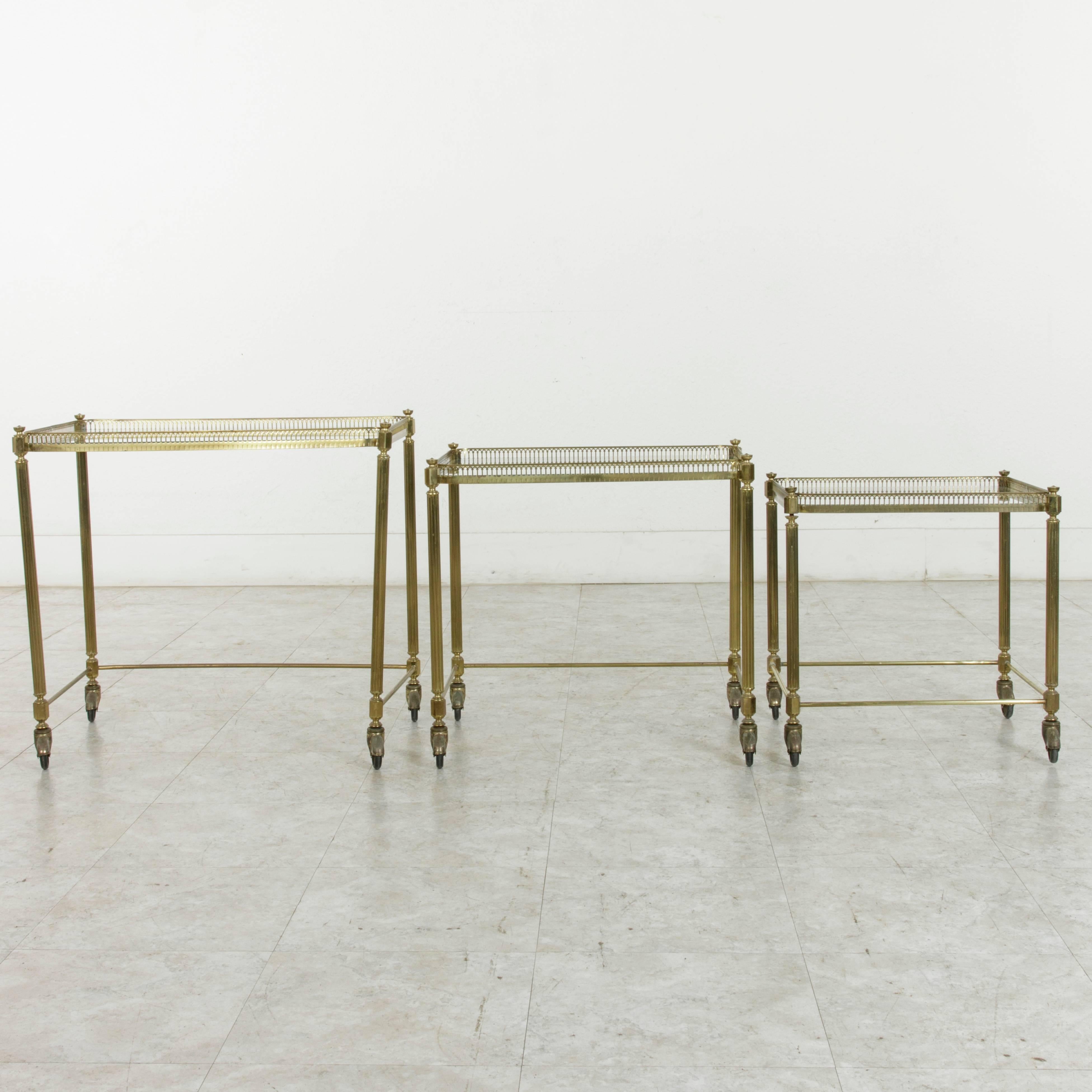 Set of Three Midcentury French Brass and Glass Nesting Tables on Casters 2