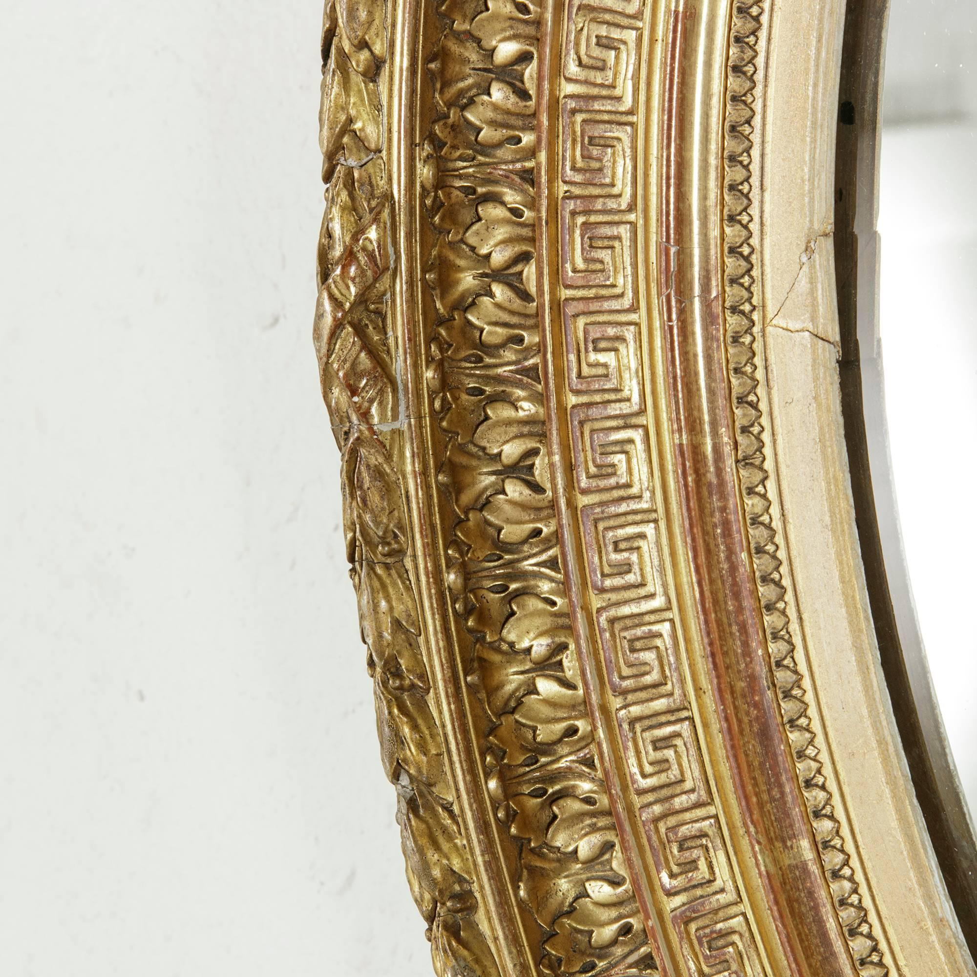 French Small-Scale 19th Century Giltwood Oval Mirror with Greek Key