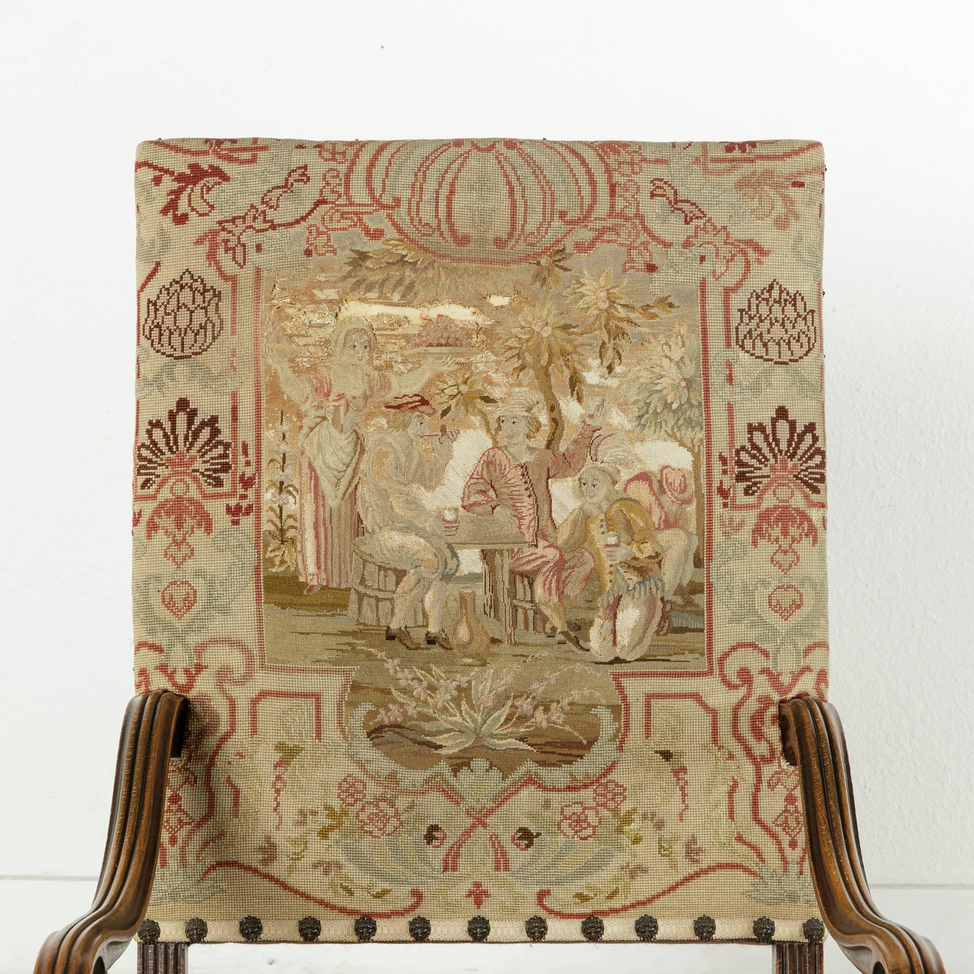 Hand-Carved 19th Century French Louis XIV Style Walnut Armchair with Original Needlepoint