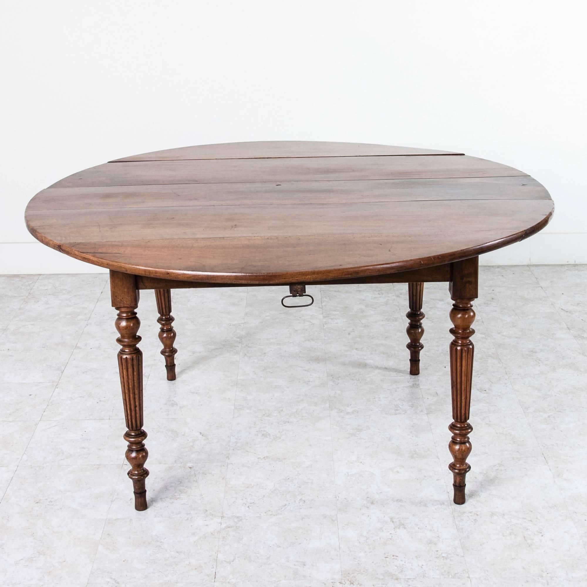 French Period Louis Philippe Solid Walnut Round Dining Table with Turned Fluted Legs