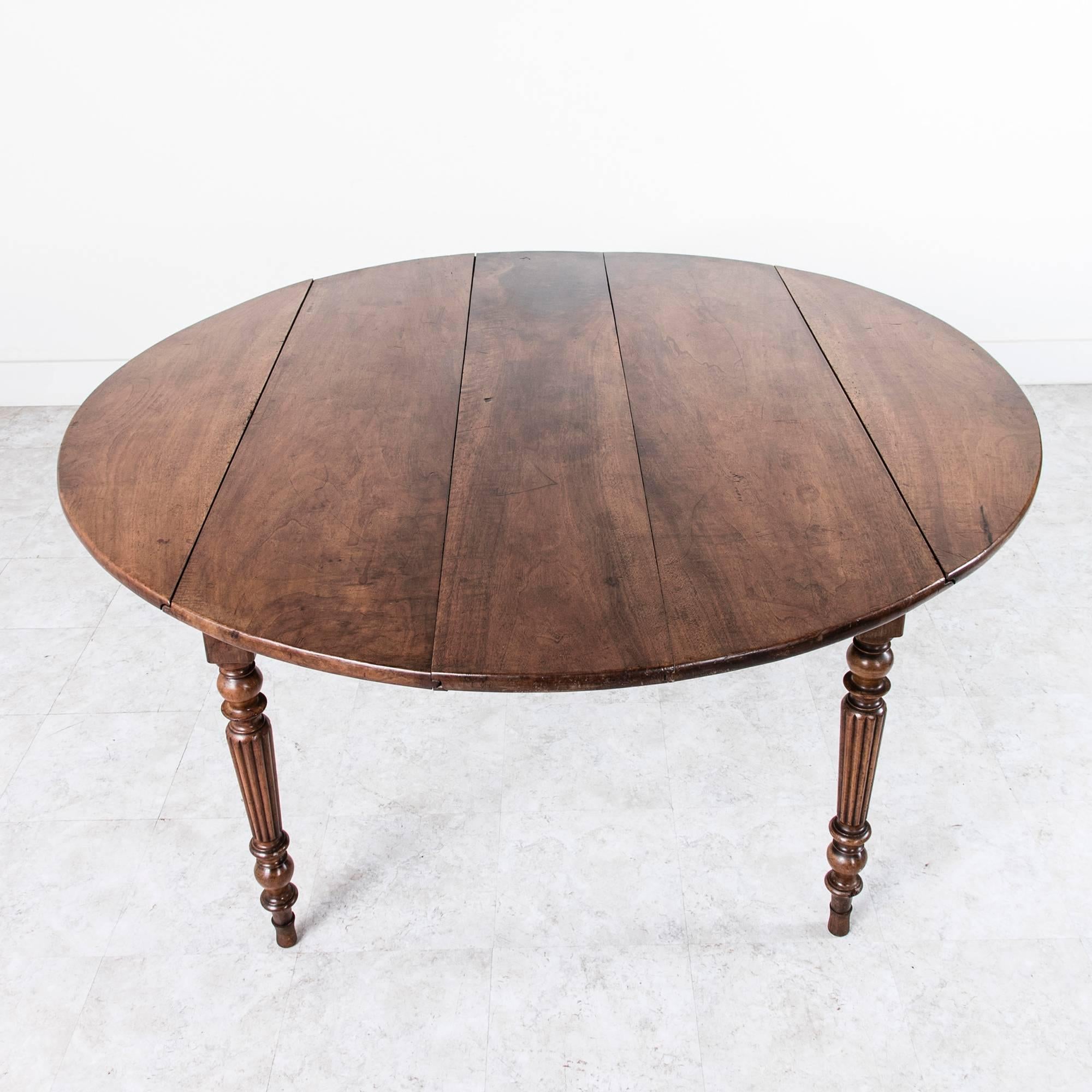 19th Century Period Louis Philippe Solid Walnut Round Dining Table with Turned Fluted Legs