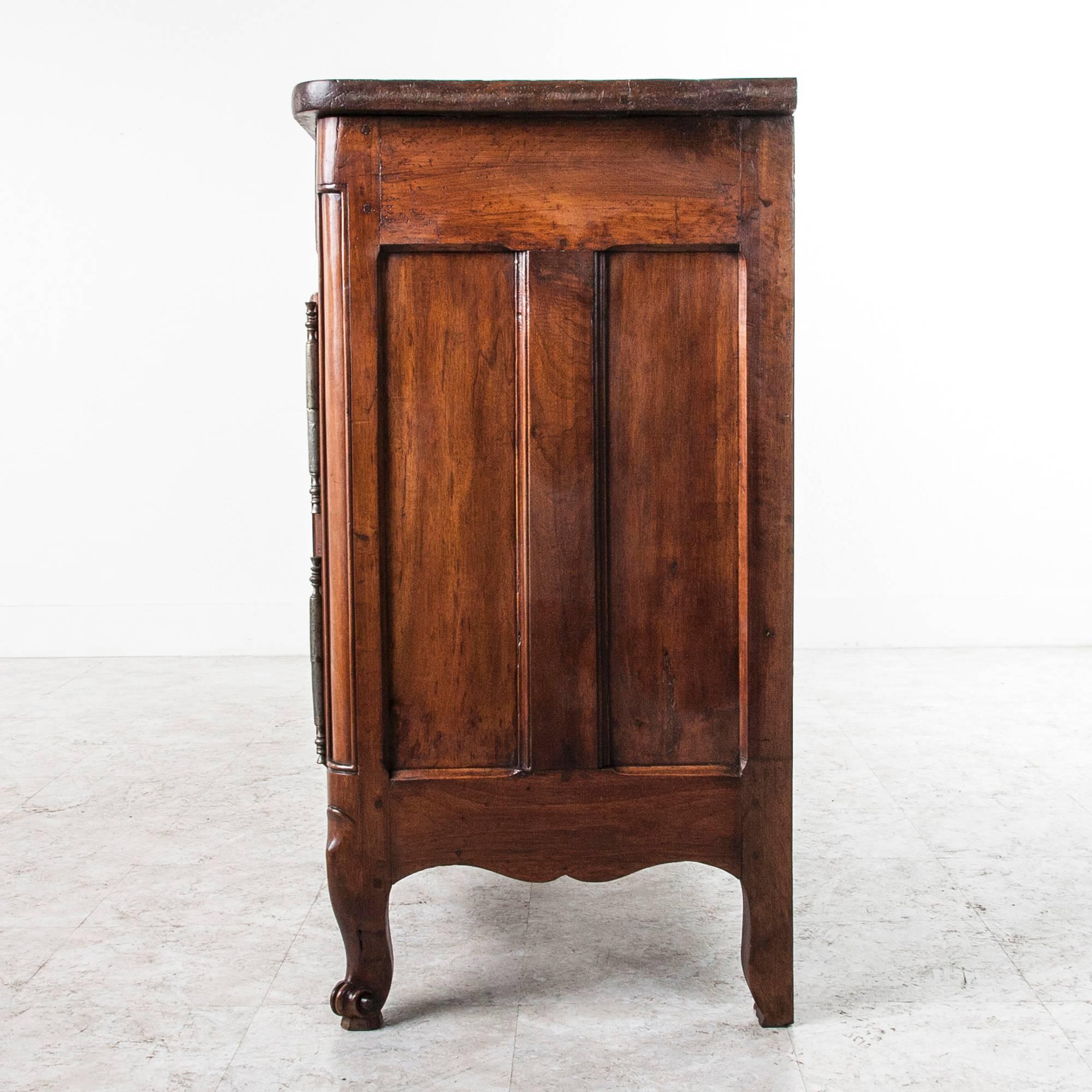 This exceptional 18th century enfilade measures nearly seven feet long. A rare find made of hand pegged solid walnut with a 1.25