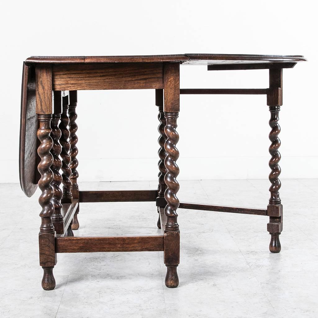 Early 20th Century French Solid Oak Gateleg Barley Twist Dining Table or Console In Excellent Condition In Fayetteville, AR
