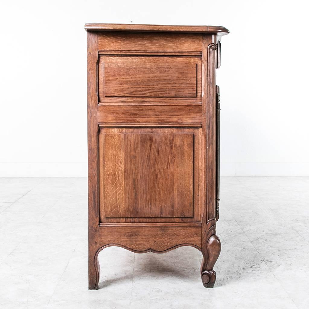 20th Century Long Hand Carved French Oak Louis XV Style Buffet or Enfilade with Bow Front