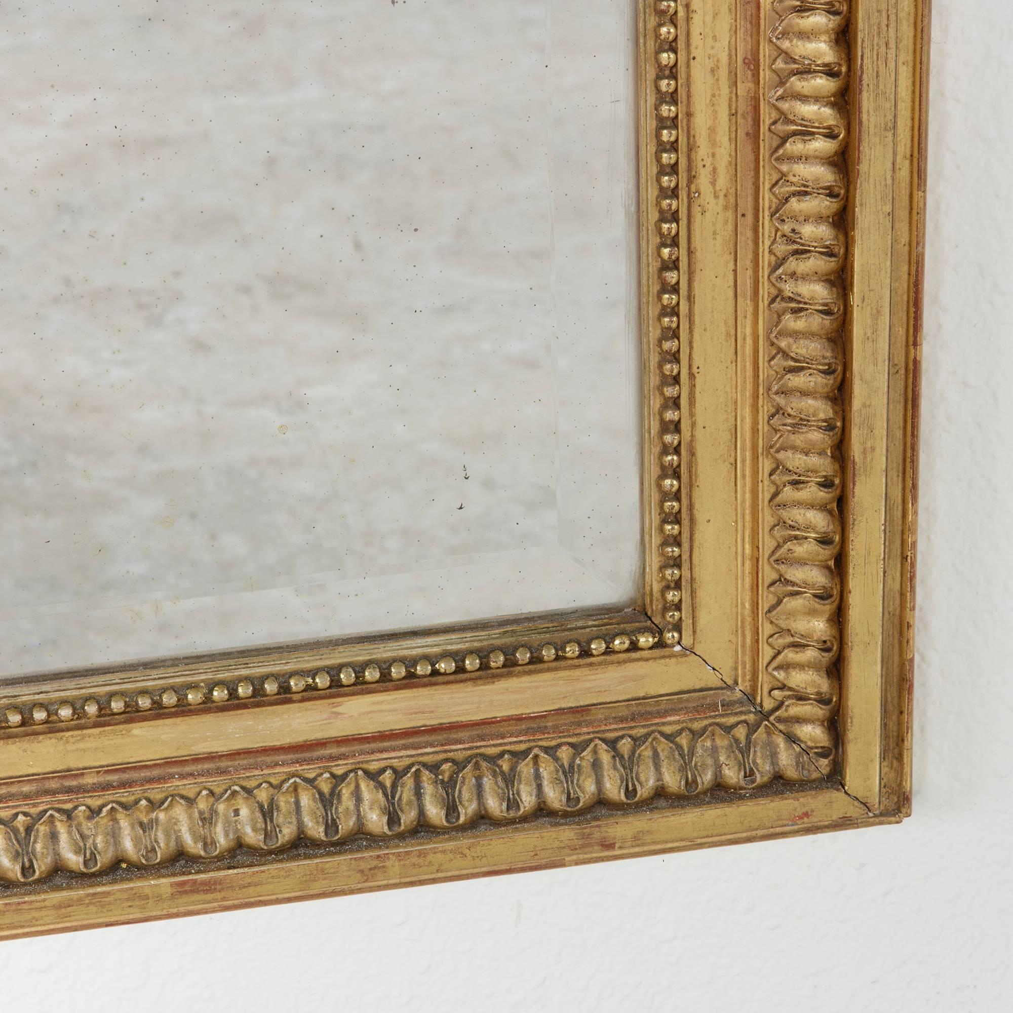 Large 19th Century Louis XVI Style Giltwood Mirror with Original Beveled Glass In Excellent Condition In Fayetteville, AR