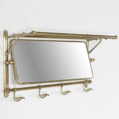 Early 20th Century Art Deco Brass Train Rack with Four Hooks and Swivel Mirror