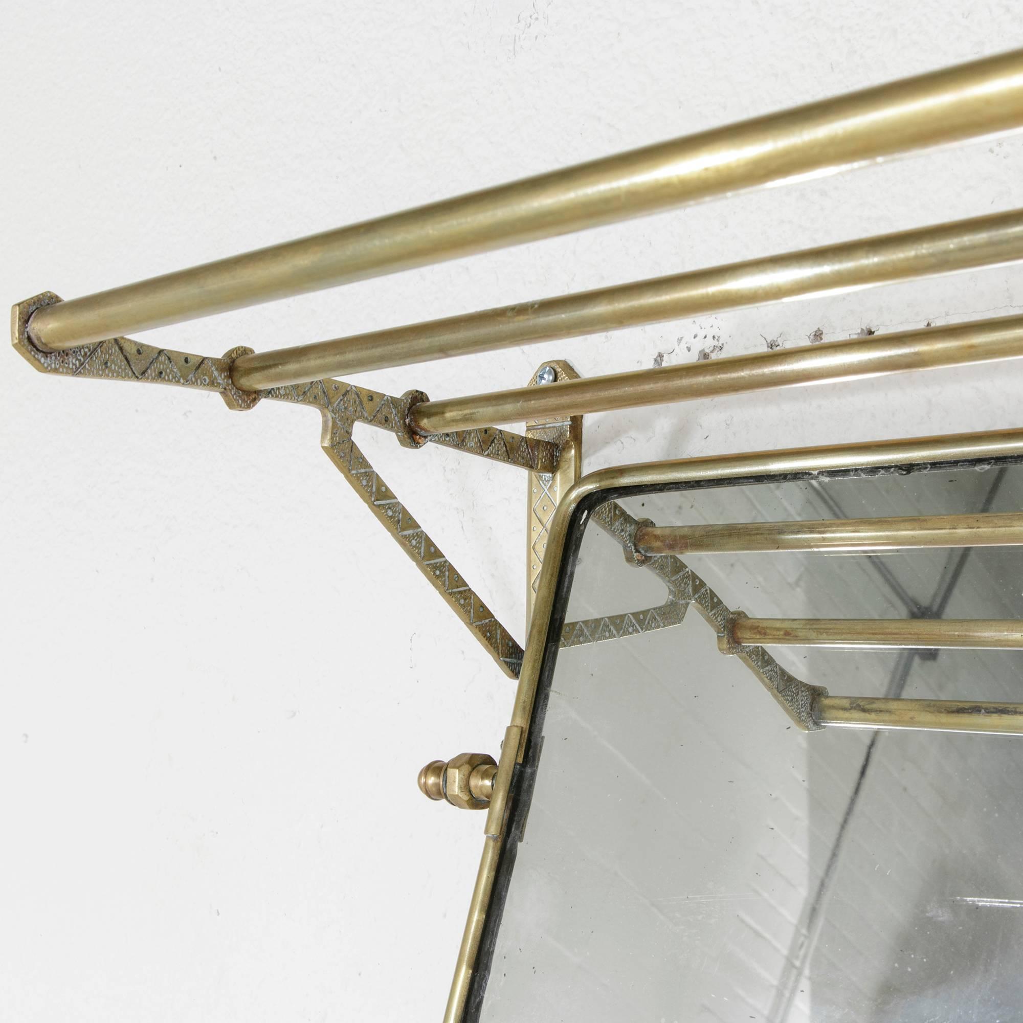 French Early 20th Century Art Deco Brass Train Rack with Four Hooks and Swivel Mirror