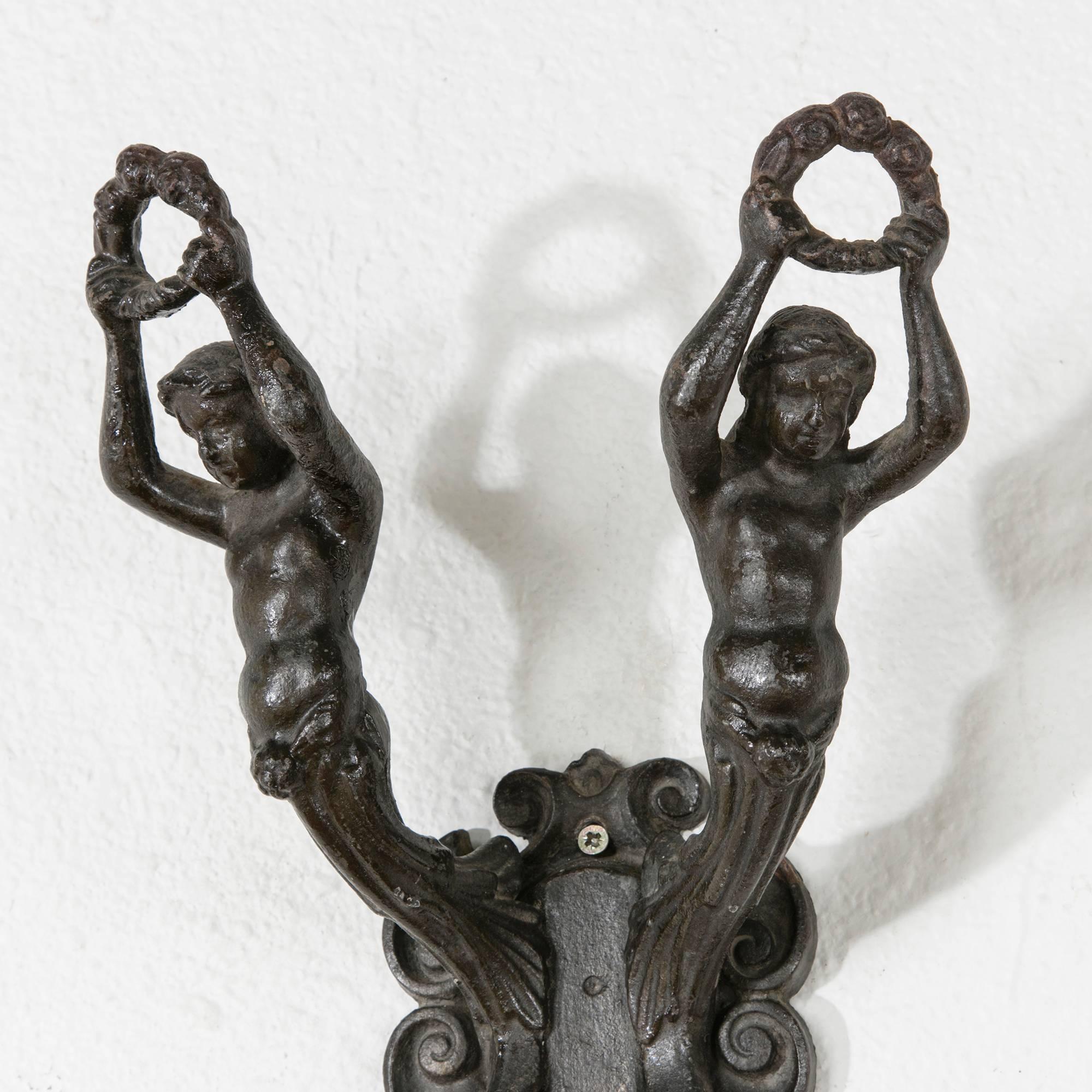 Early 20th Century Large French Art Nouveau Period Iron Coat and Hat Hook with Two Classic Figures
