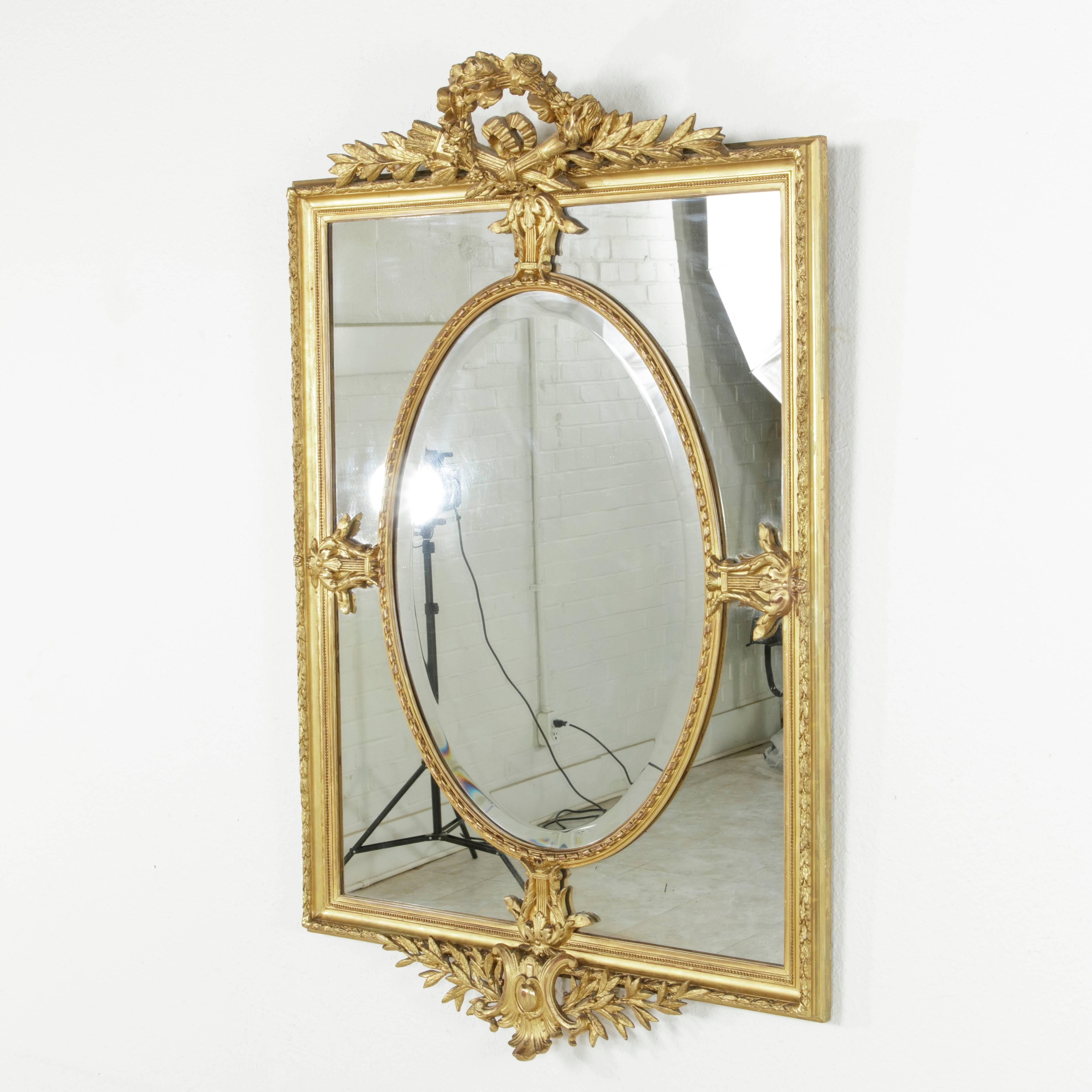 Large 19th Century Louis XVI Style Giltwood and Beveled Mirror with Inset Oval 1