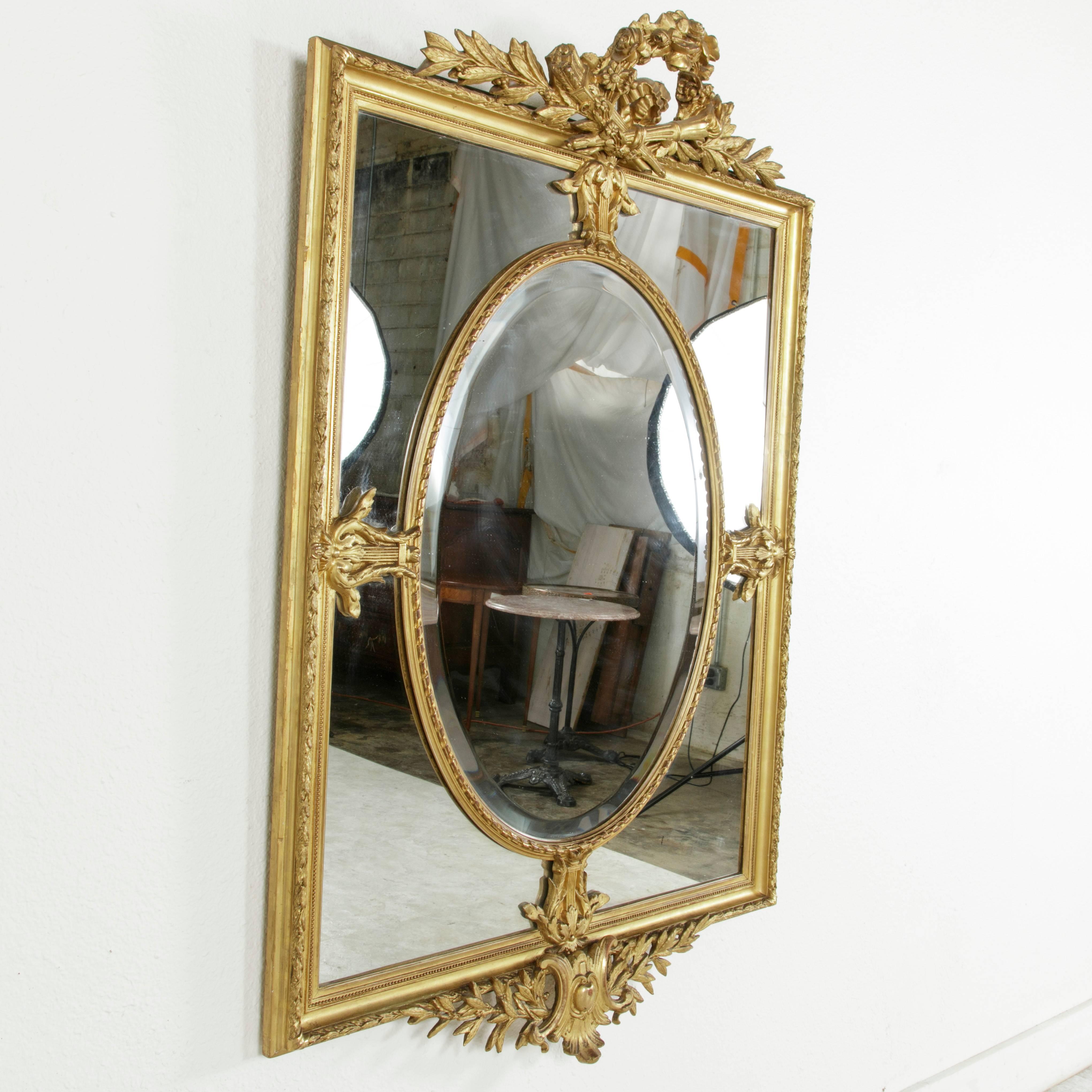 Large 19th Century Louis XVI Style Giltwood and Beveled Mirror with Inset Oval 3