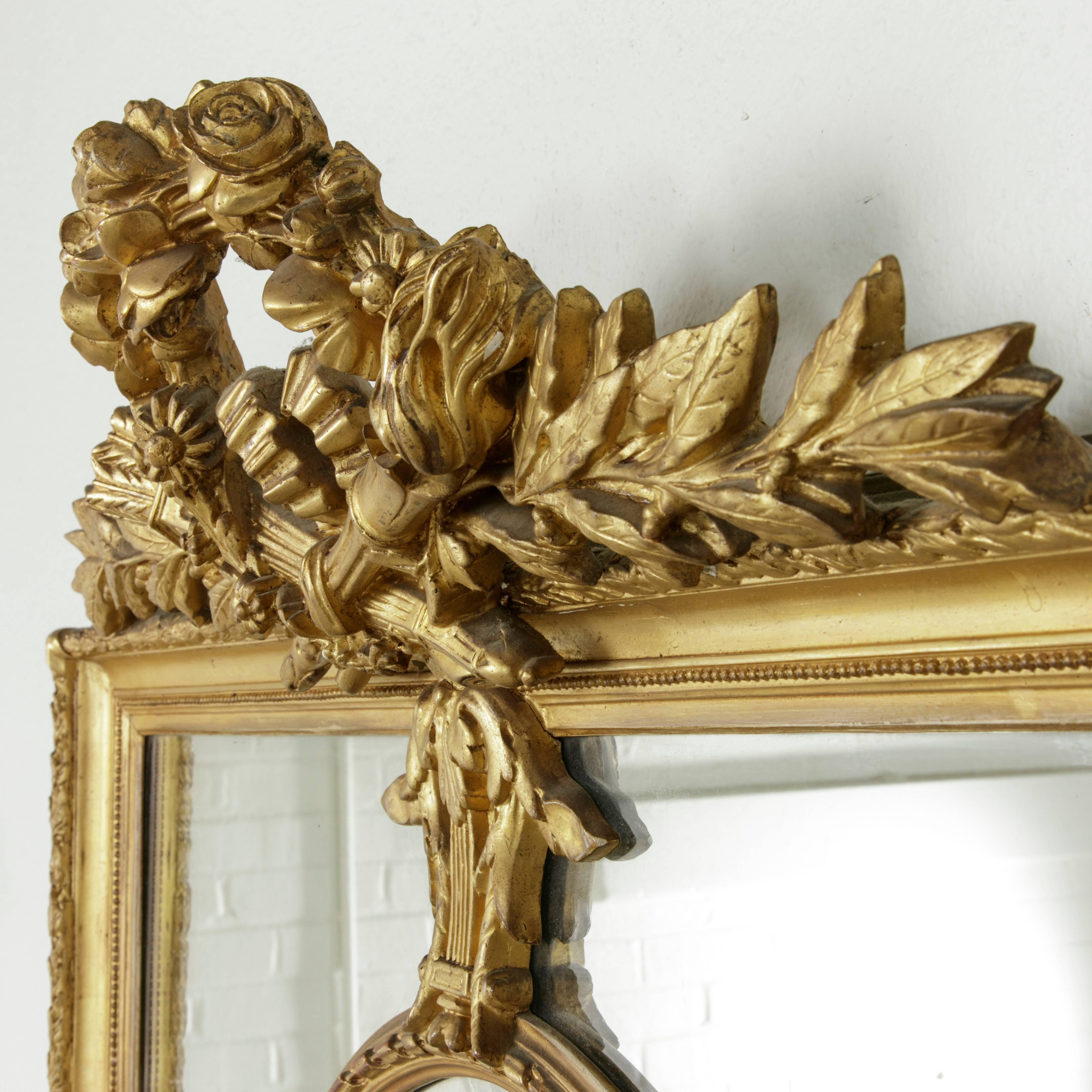 French Large 19th Century Louis XVI Style Giltwood and Beveled Mirror with Inset Oval