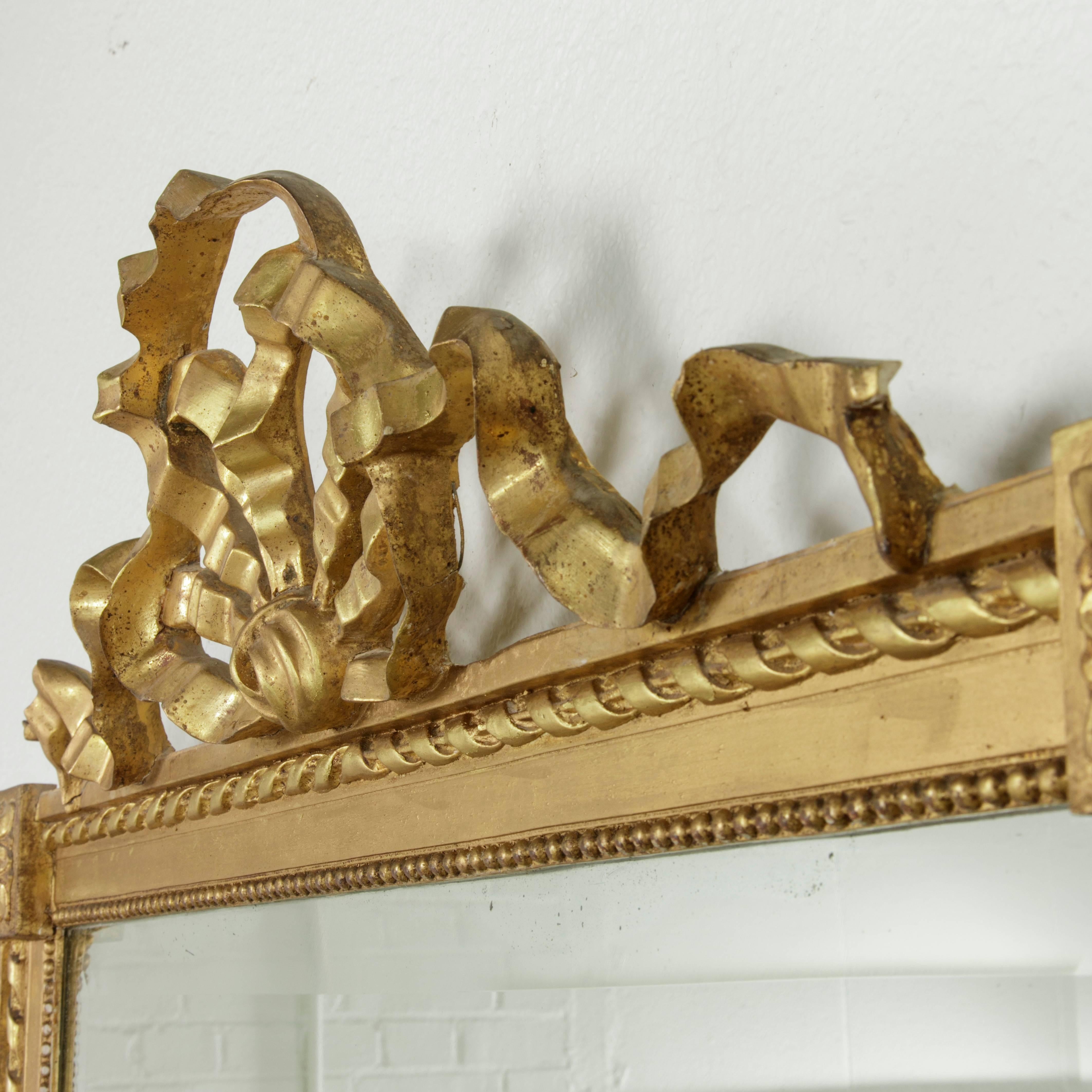 19th Century French Louis XVI Style Giltwood Mirror with Ribbon and Bow Motif In Excellent Condition In Fayetteville, AR