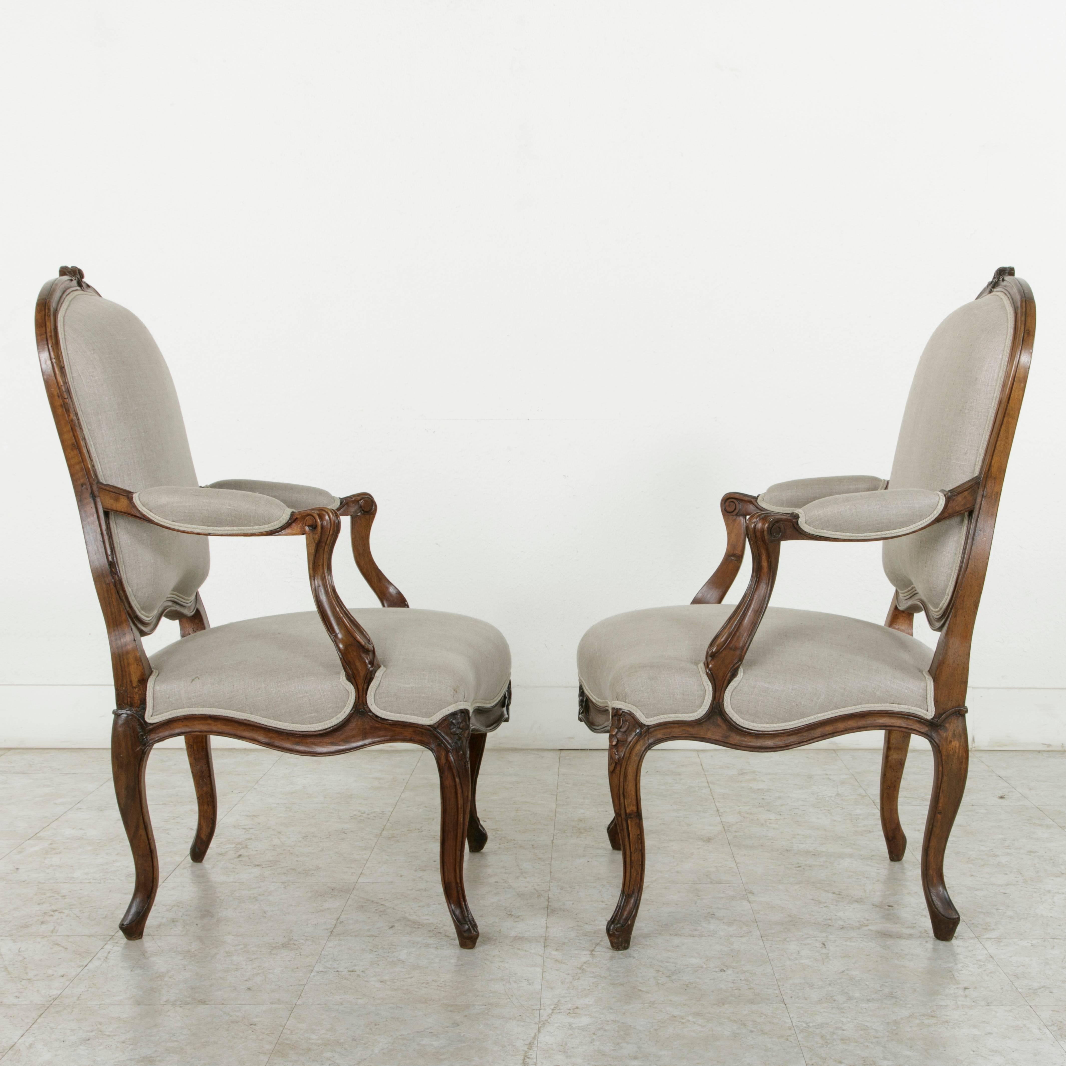 Pair of 19th Century Hand Carved Walnut French Louis XV Style Armchairs in Linen 1