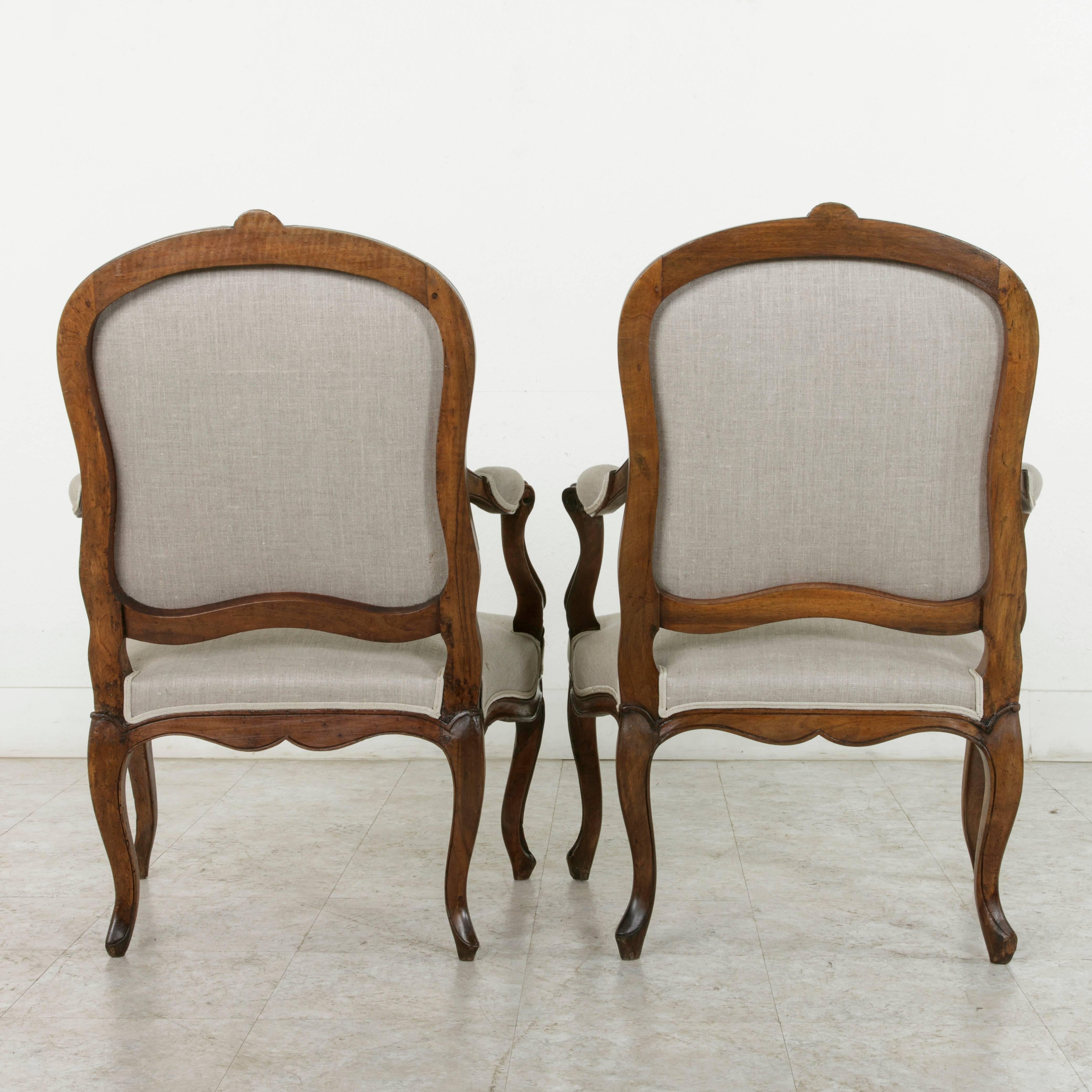 Upholstery Pair of 19th Century Hand Carved Walnut French Louis XV Style Armchairs in Linen