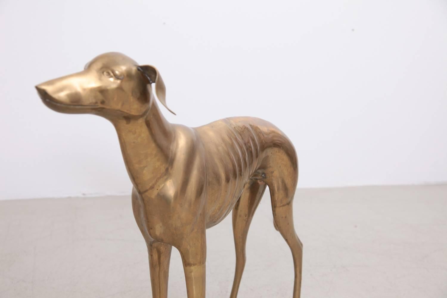 brass greyhound dog
