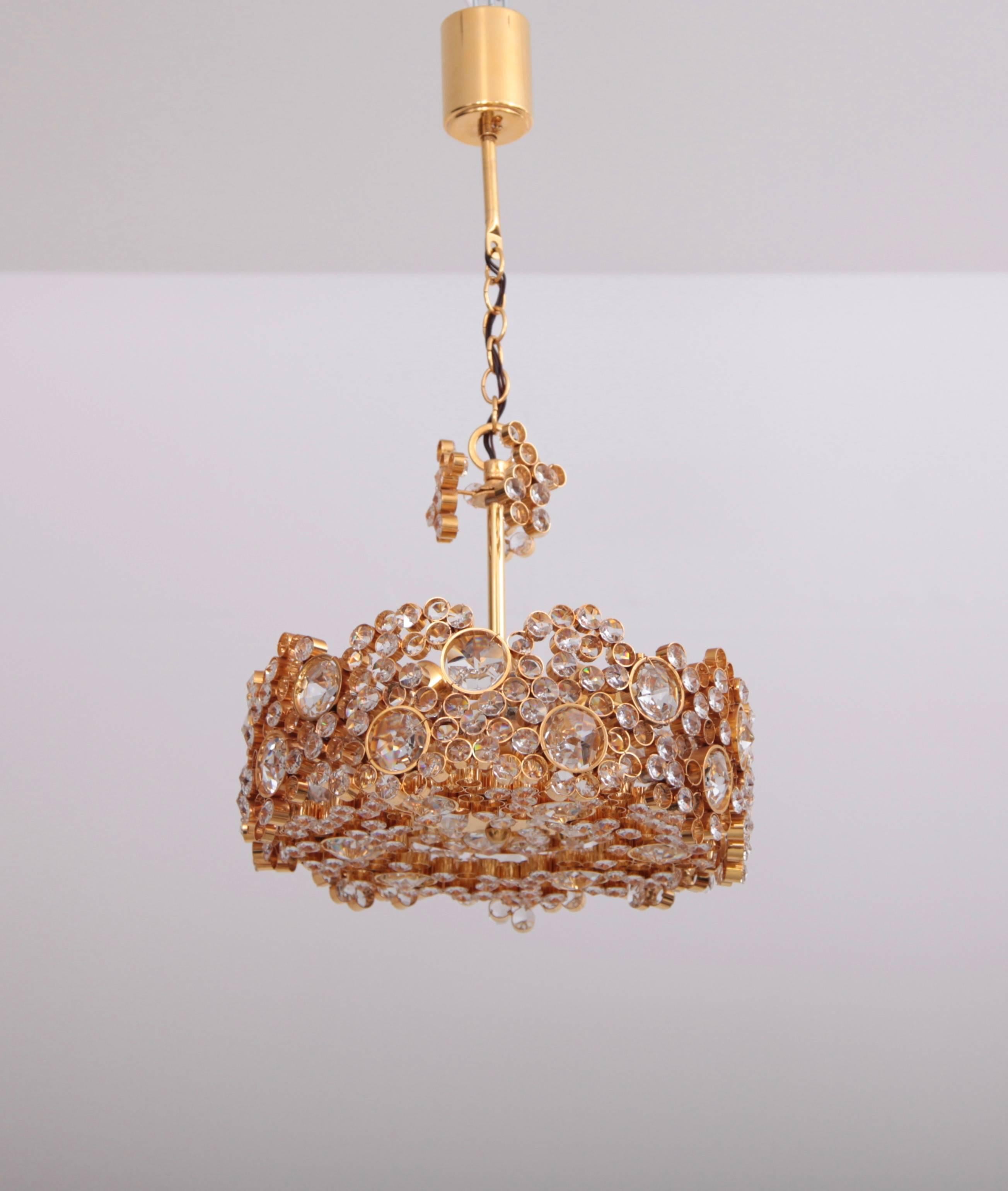 German Outstanding Gilded Brass and Crystal Glass Encrusted Chandelier by Palwa For Sale