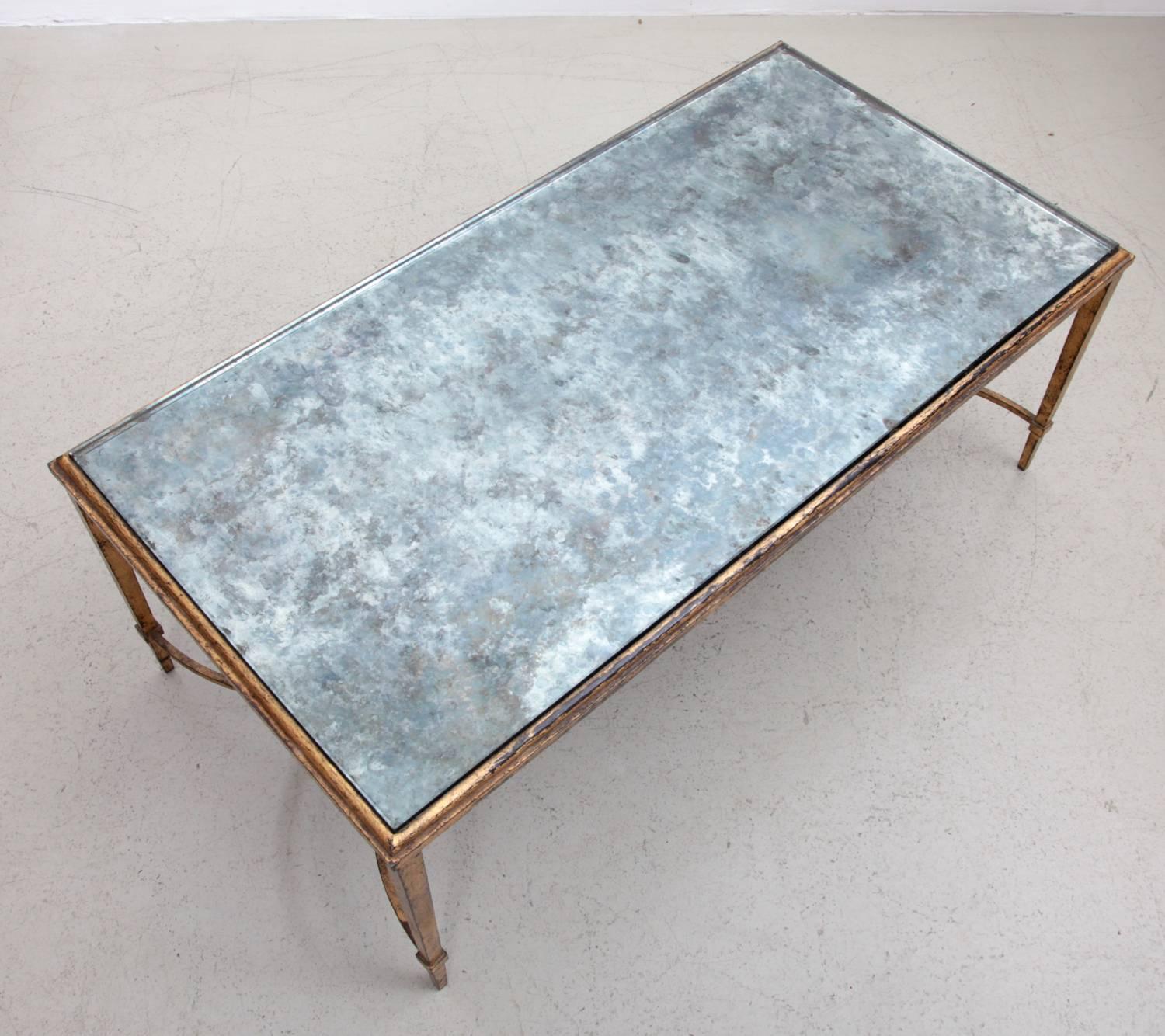 Rare excellent Maison Ramsay coffee table with silver plated glass with no chips from the early 1960s.

