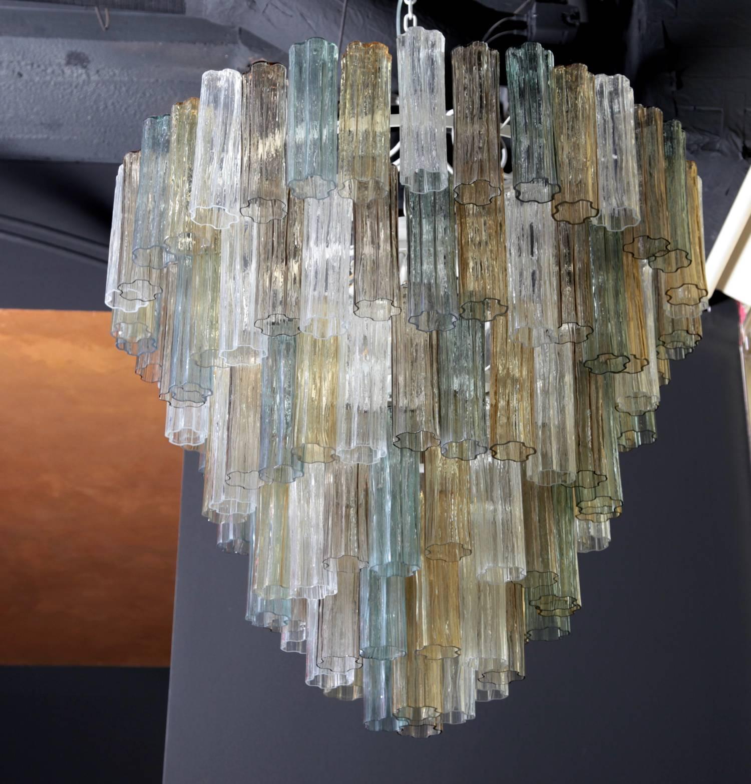 Wonderful and very huge five-tier Murano glass Tronchi chandeliers. The handblown multi-color Murano glasses bring a incredible light in every room. The chandeliers are in very good condition. 9 x E27 fitting.