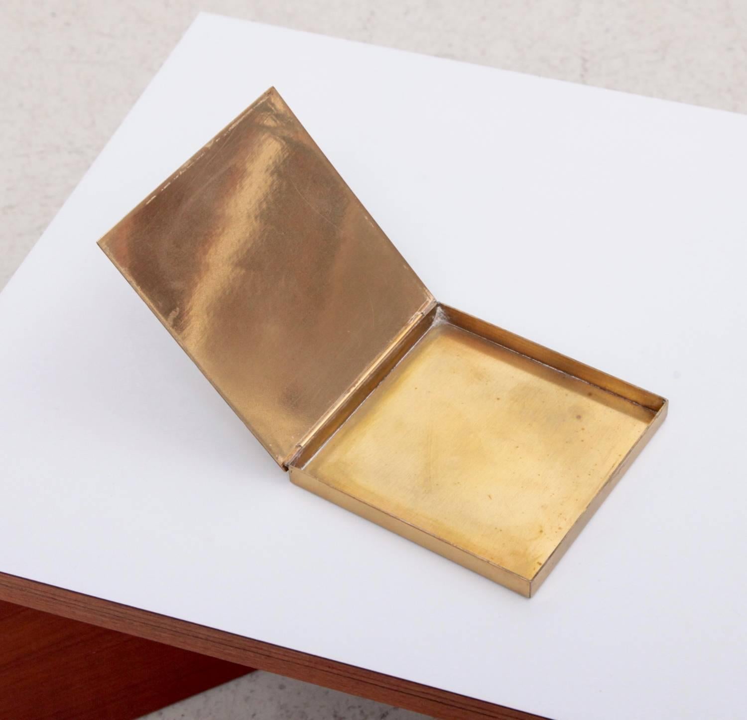 Brass cigarette case or box designed by Gabriella Crespi. The box is signed and a rare and hard to find collectors item.