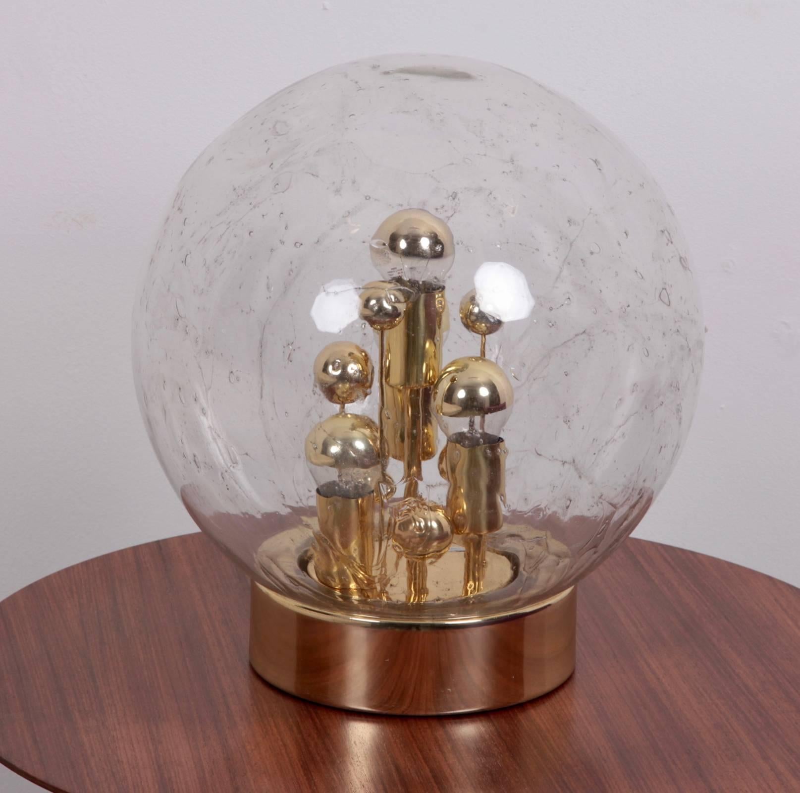Very nice and huge handblown glass globe and gilt metal table lamp by German high end manufacturer Doria. Four x Model A / E27 bulbs.
To be on the the safe side, the lamp should be checked locally by a specialist concerning local requirements.

