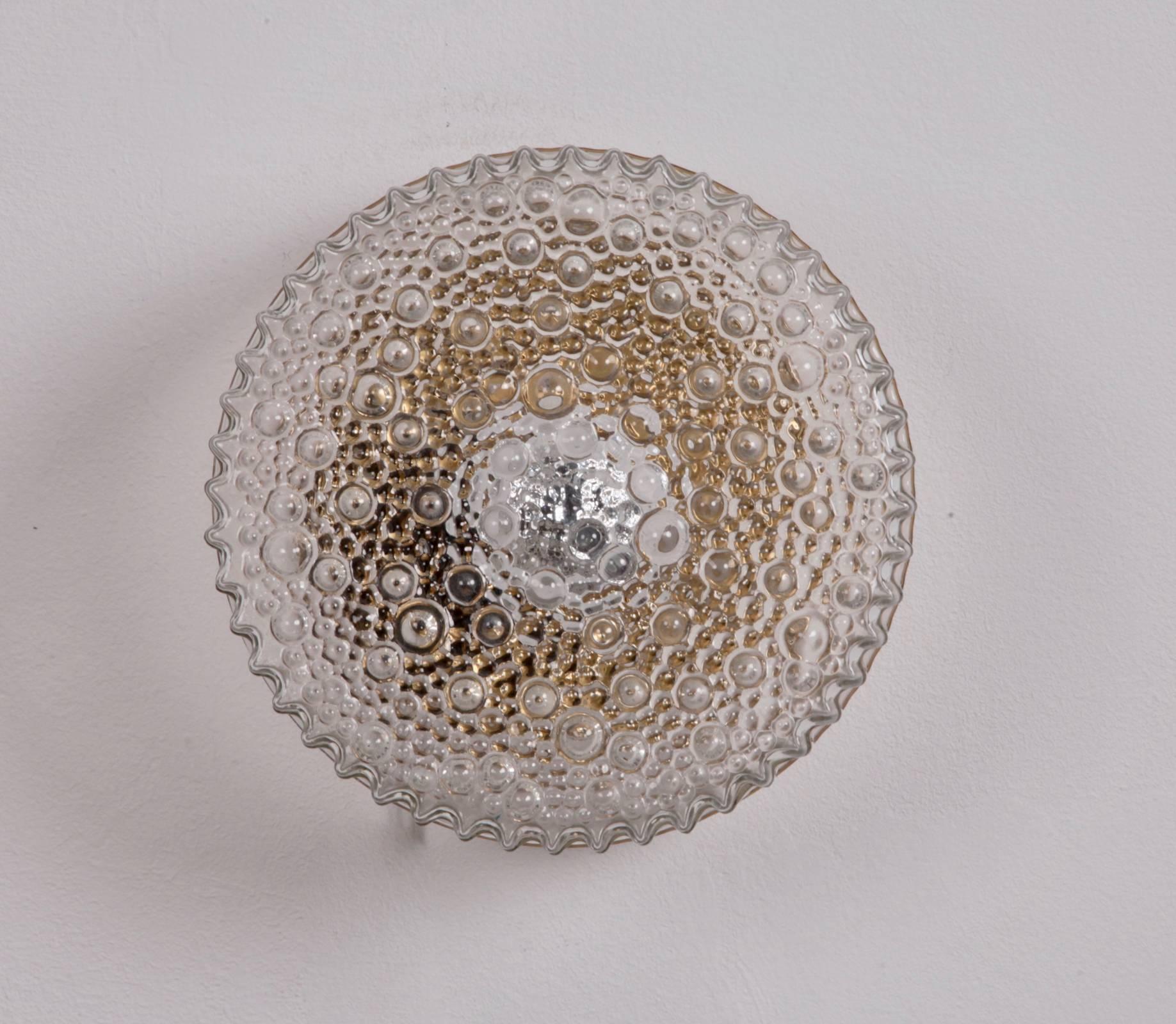 Three beautiful bubble glass flush mount or sconce attributed to German high end manufacturer Glashütte Limburg. The lamps are produced in the 1960s and they have a fantastic glass quality. One x Model A / E27