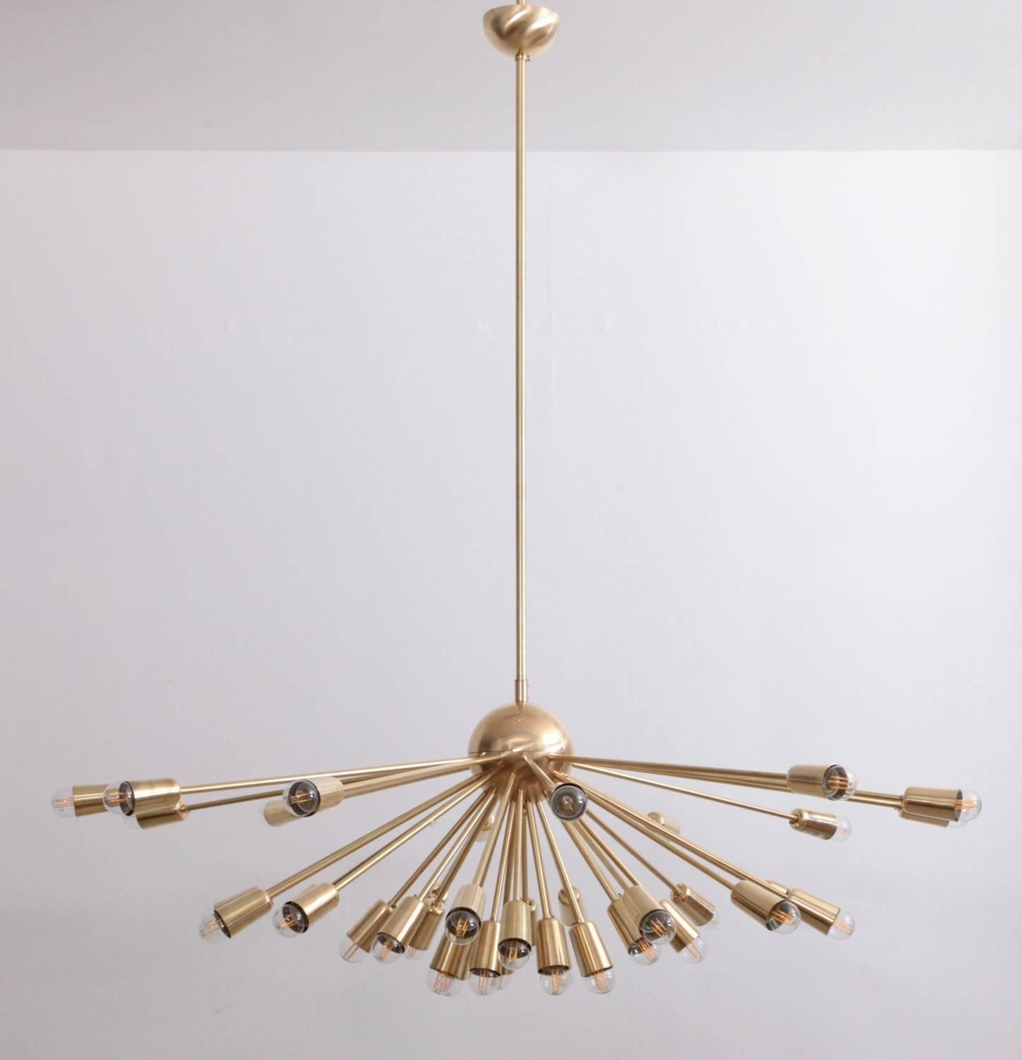 Very huge and impressive brass Sputnik flush mount or chandelier in the manner of Stilnovo. Form and size makes the lamp to a real highlight in every room.
To be on the the safe side, the lamp should be checked locally by a specialist concerning