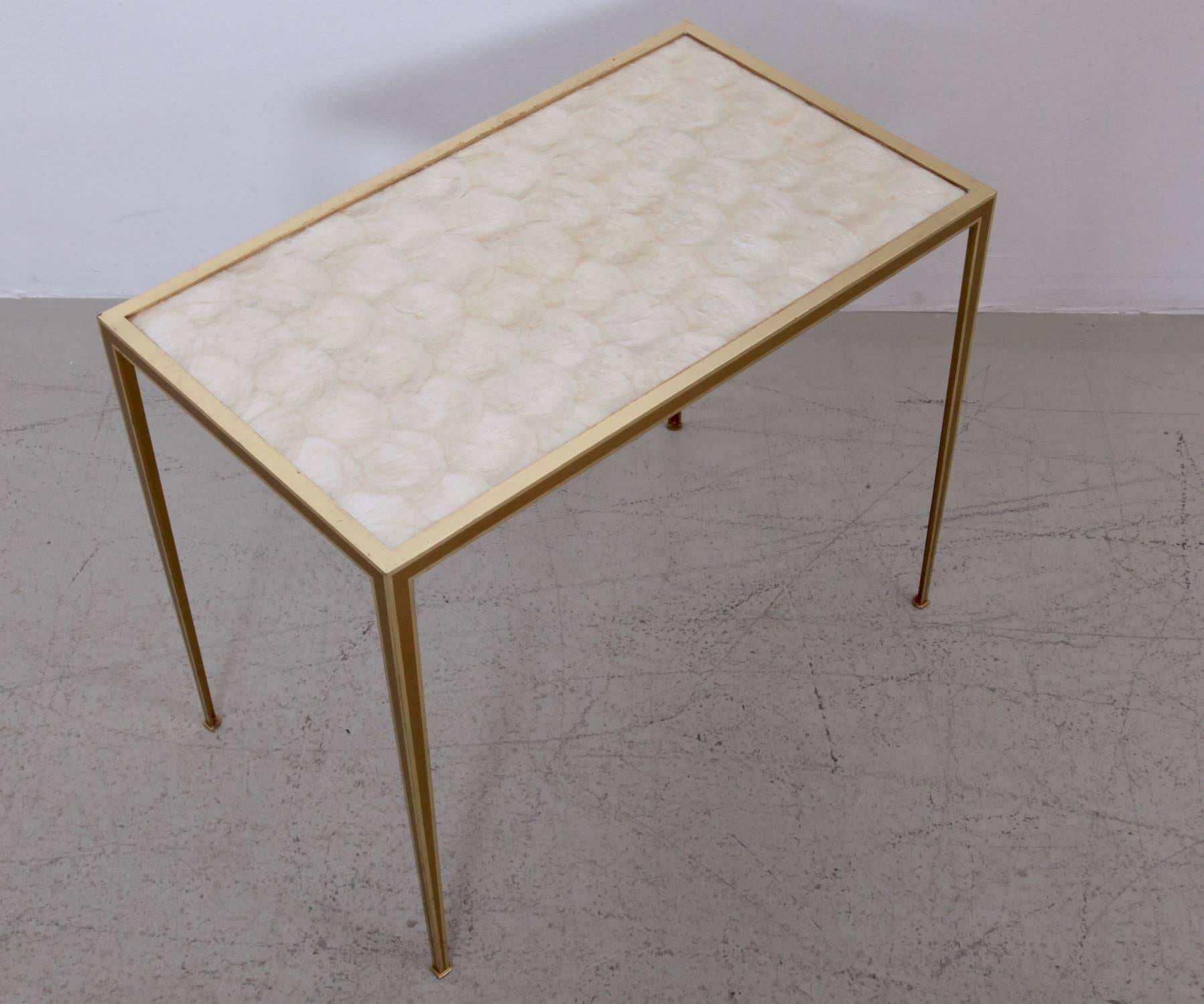 Rare mother-of-pearl side table by Vereinigte Werkstätten München in excellent condition. Solid brass frame polished on the edge and matte on the sides.