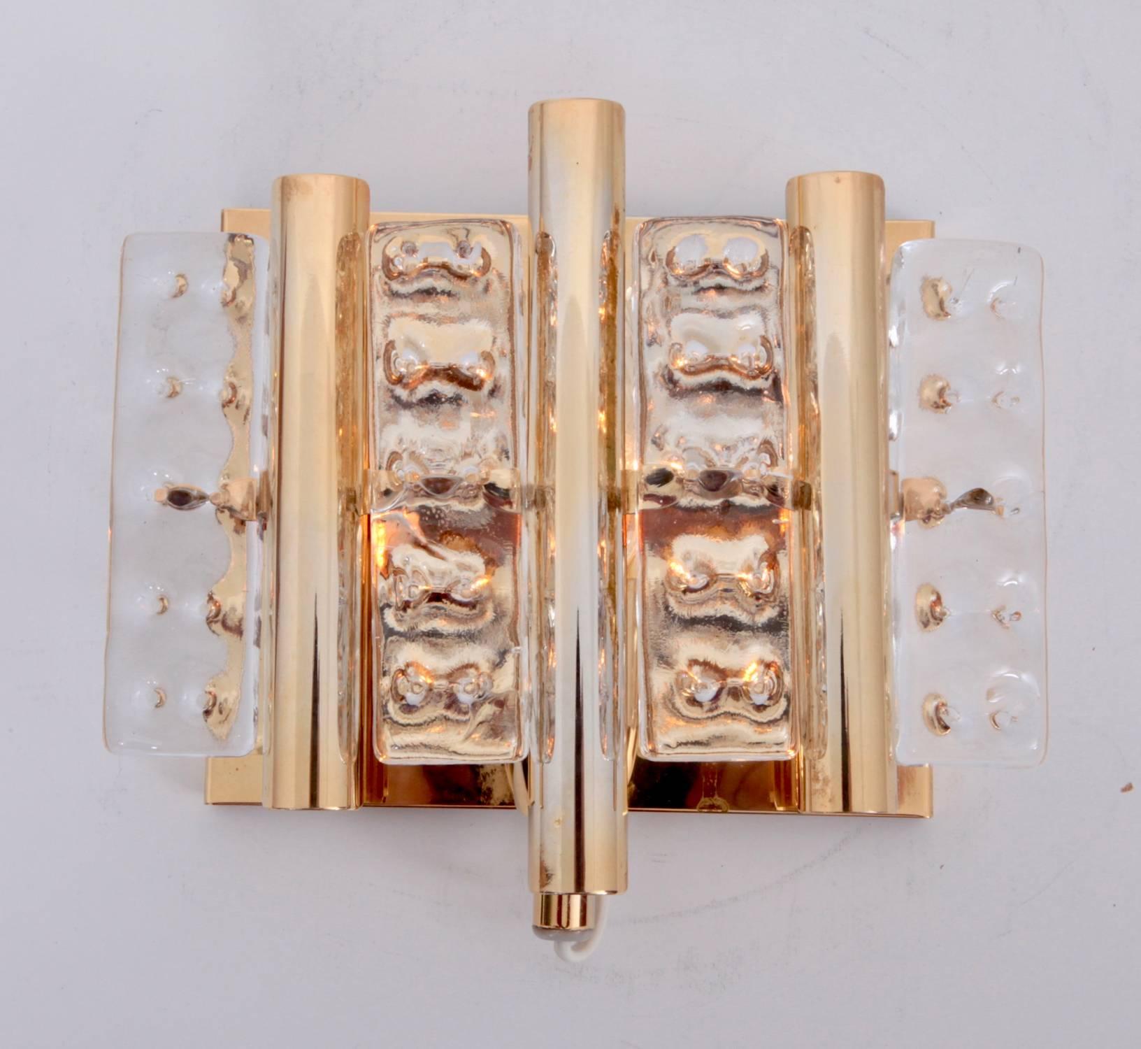 One of ten Fagerlund wall lamps with 1xe14 bulb. Heavy quality and thick glass.
To be on the the safe side, the lamp should be checked locally by a specialist concerning local requirements.
