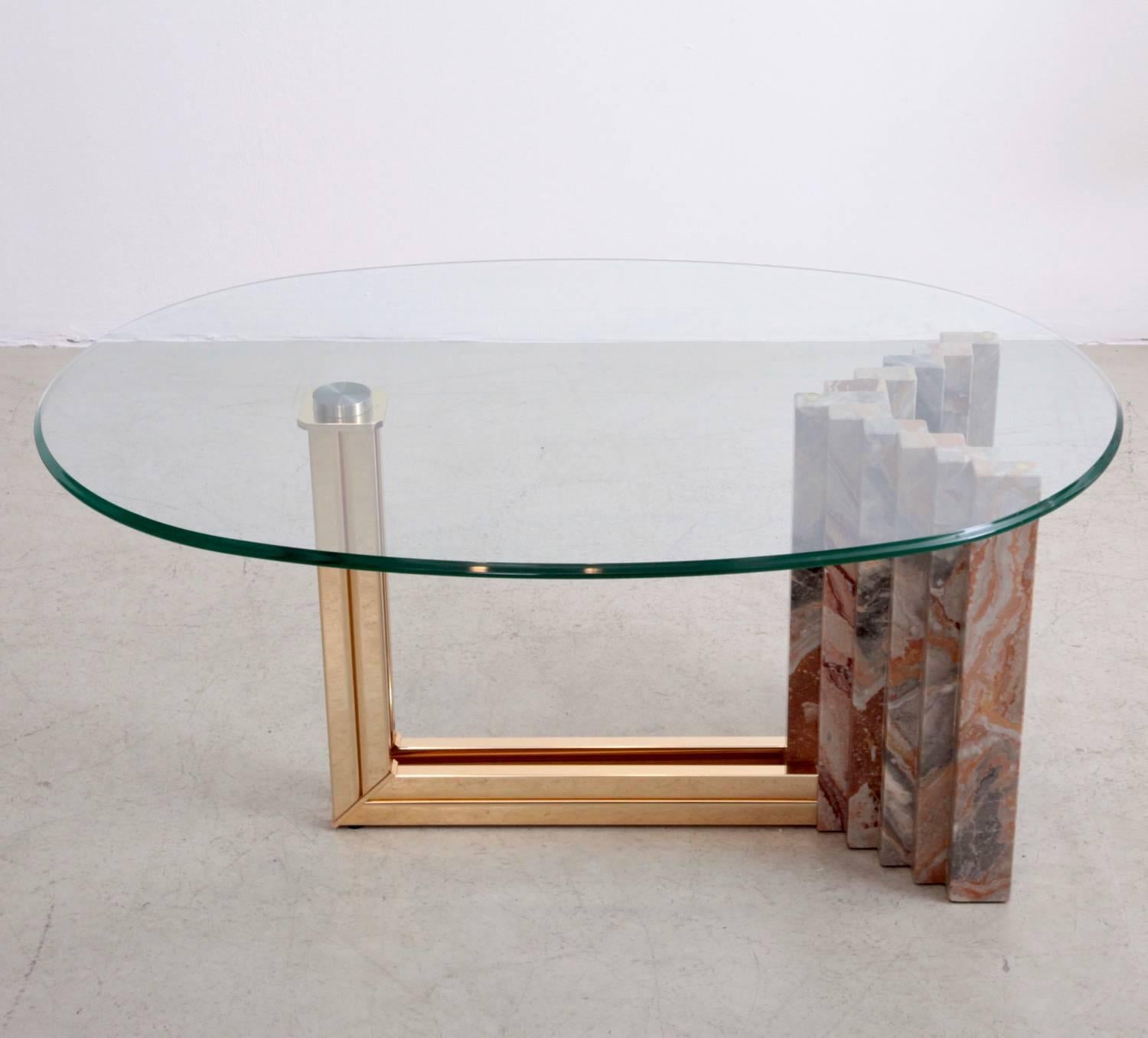 Mint high end manufactured 1970s marble and brass coffee table with very elegant glass top.

